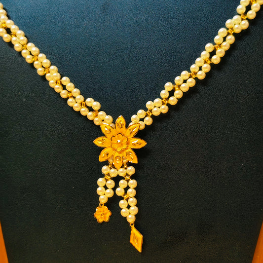 TRJ (RP) NP APPROX WGT: 1.450 GM HUID HALLMARK 22KT GOLD PENDANT (1 PIECE) WITH PEARL TASSEL BY RAJLAXMI.