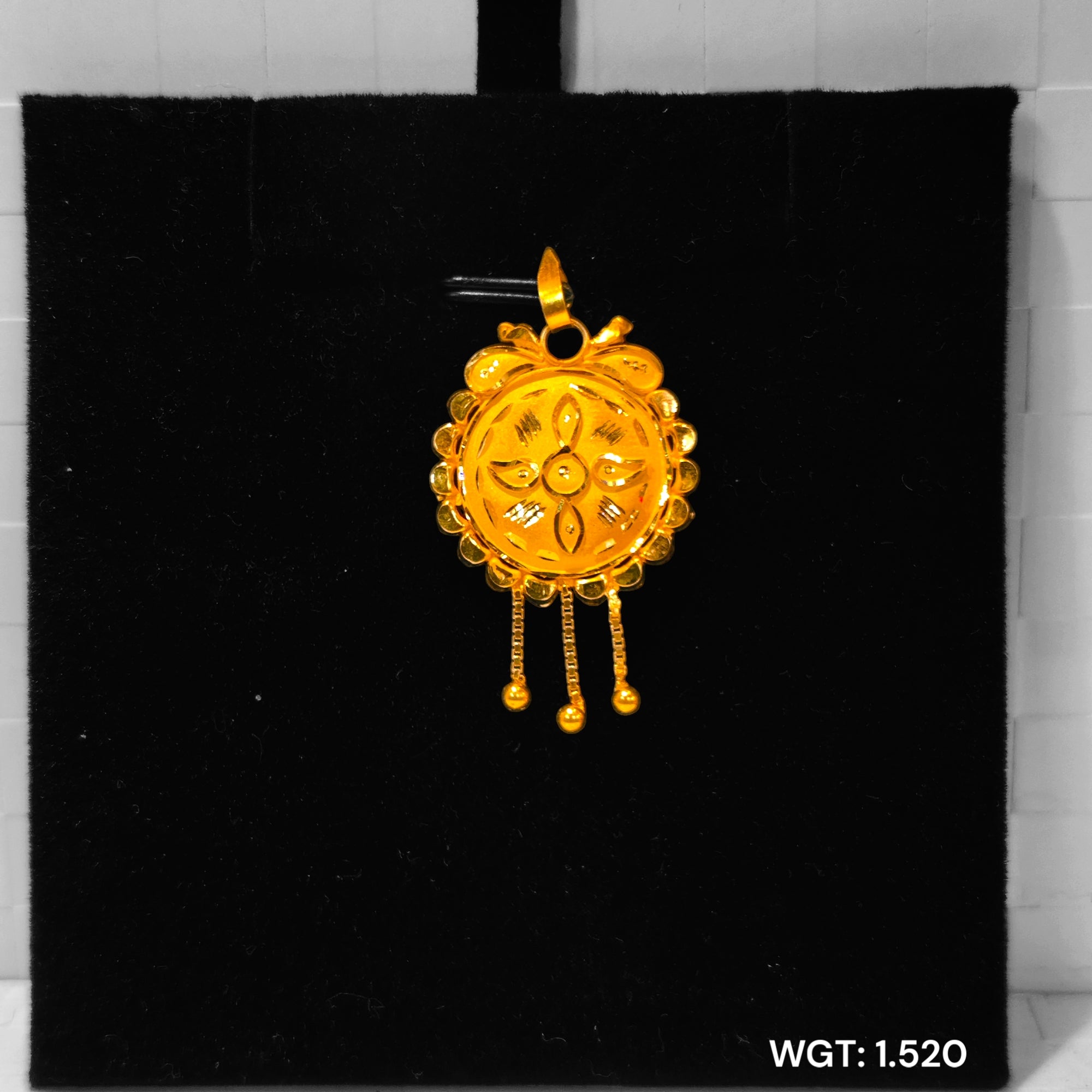 (GLC22) TRJ WGT: 1.520 GM APPROX 22KT HUID HALLMARK GOLD LOCKET 1 PIECE WITH ADJUSTABLE TASSEL.