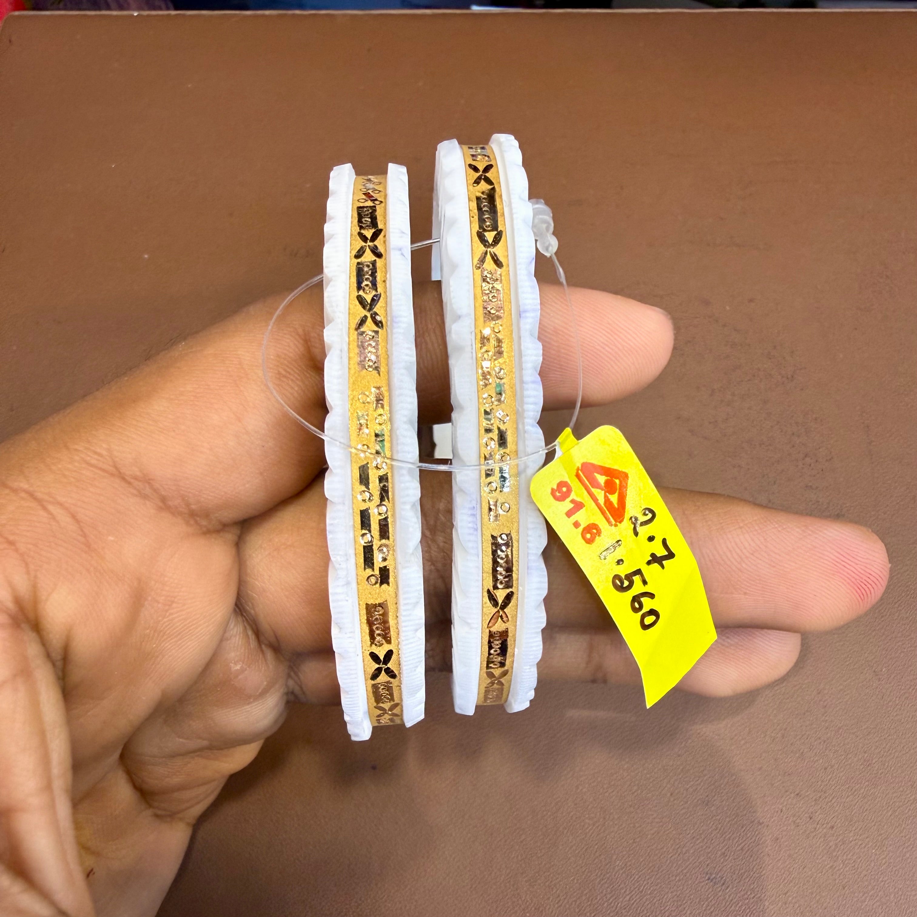 SAKHA BADHANO- (SIZE:27) WGT: 1.560 GM APPROX HUID HALLMARK 22KT GOLD SAKHA BADHANO BANGLES 1 PAIR DESIGN FOR REGULAR USE.