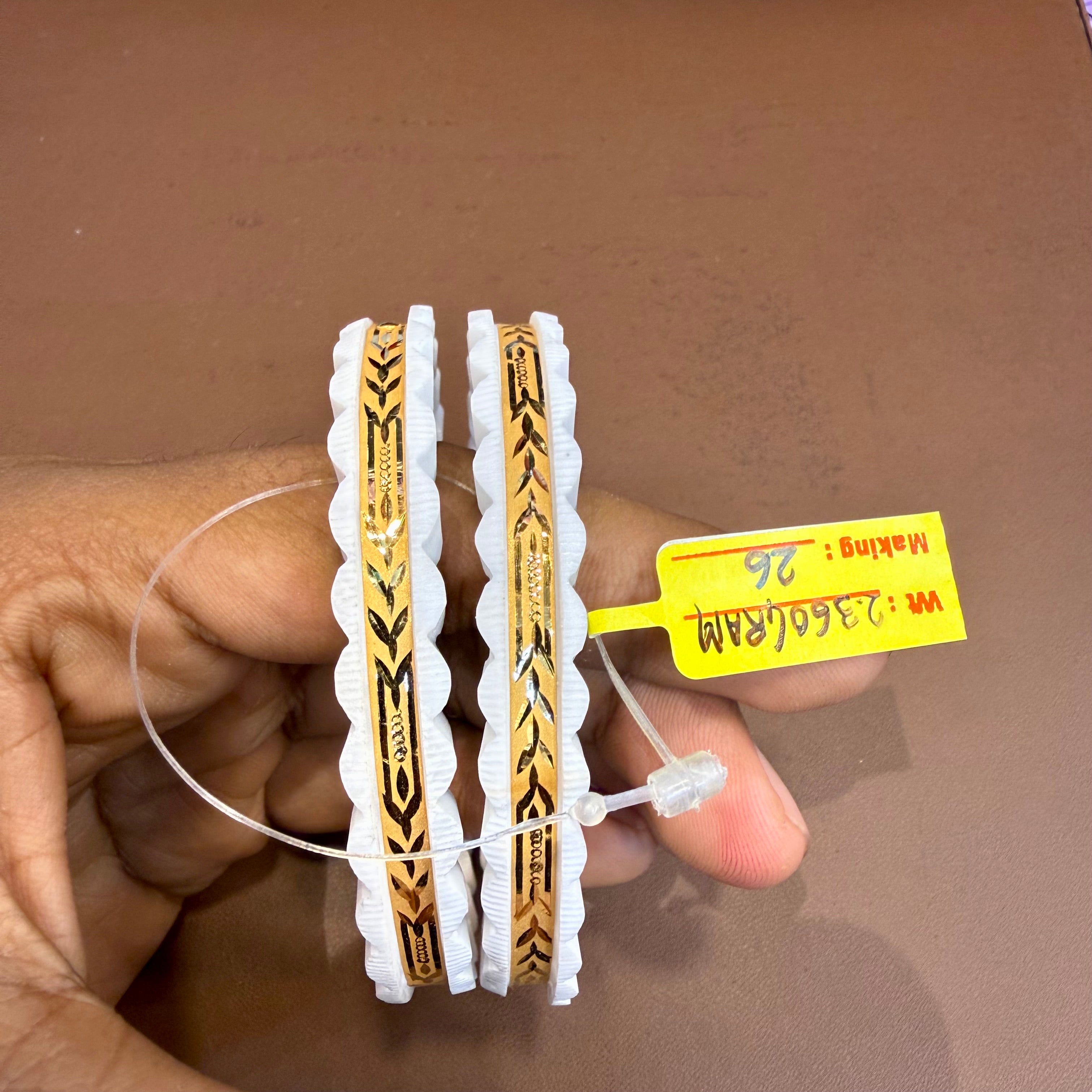 SAKHA BADHANO- (SIZE:26) WGT: 2.360 GM APPROX HUID HALLMARK 22KT GOLD SAKHA BADHANO BANGLES 1 PAIR DESIGN FOR REGULAR USE.