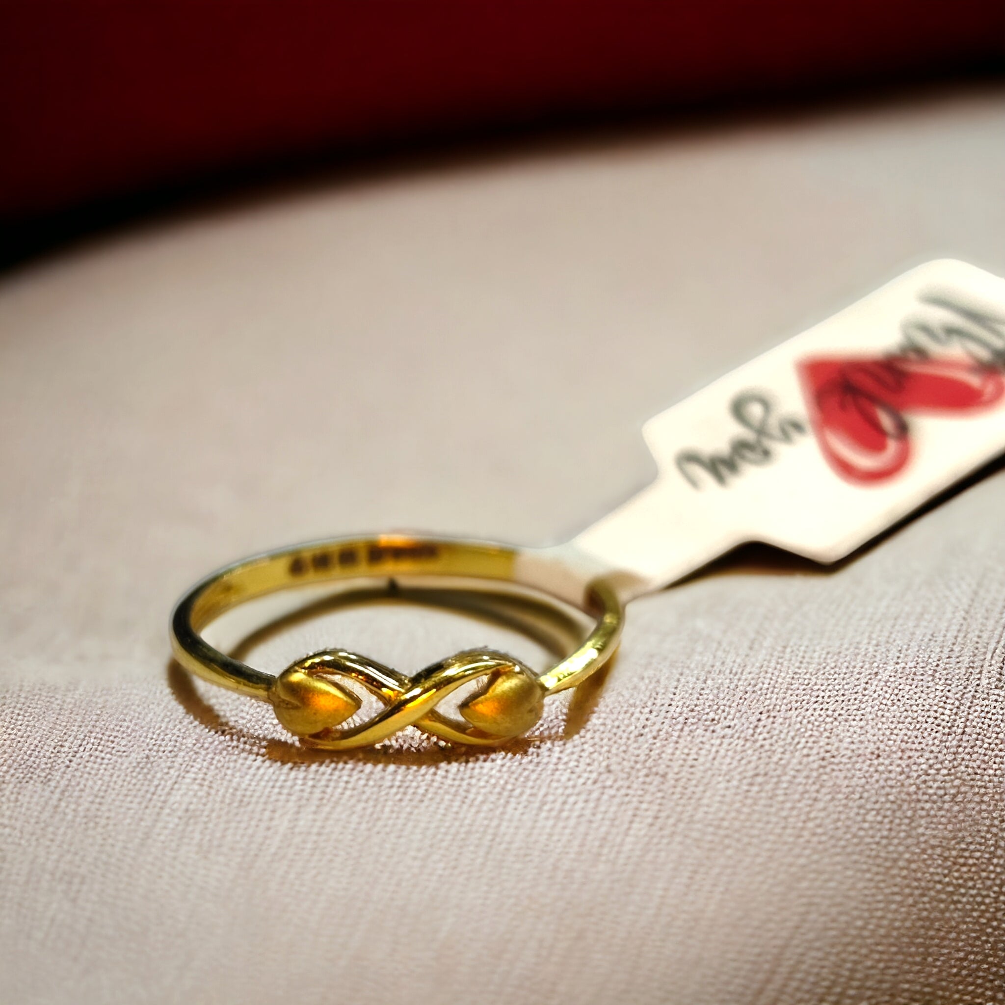 (GLFR14) TRJ (SIZE: 09) WGT: 0.810 GM APPROX 14KT HALLMARK GOLD RING FOR WOMEN 1 PIECE.