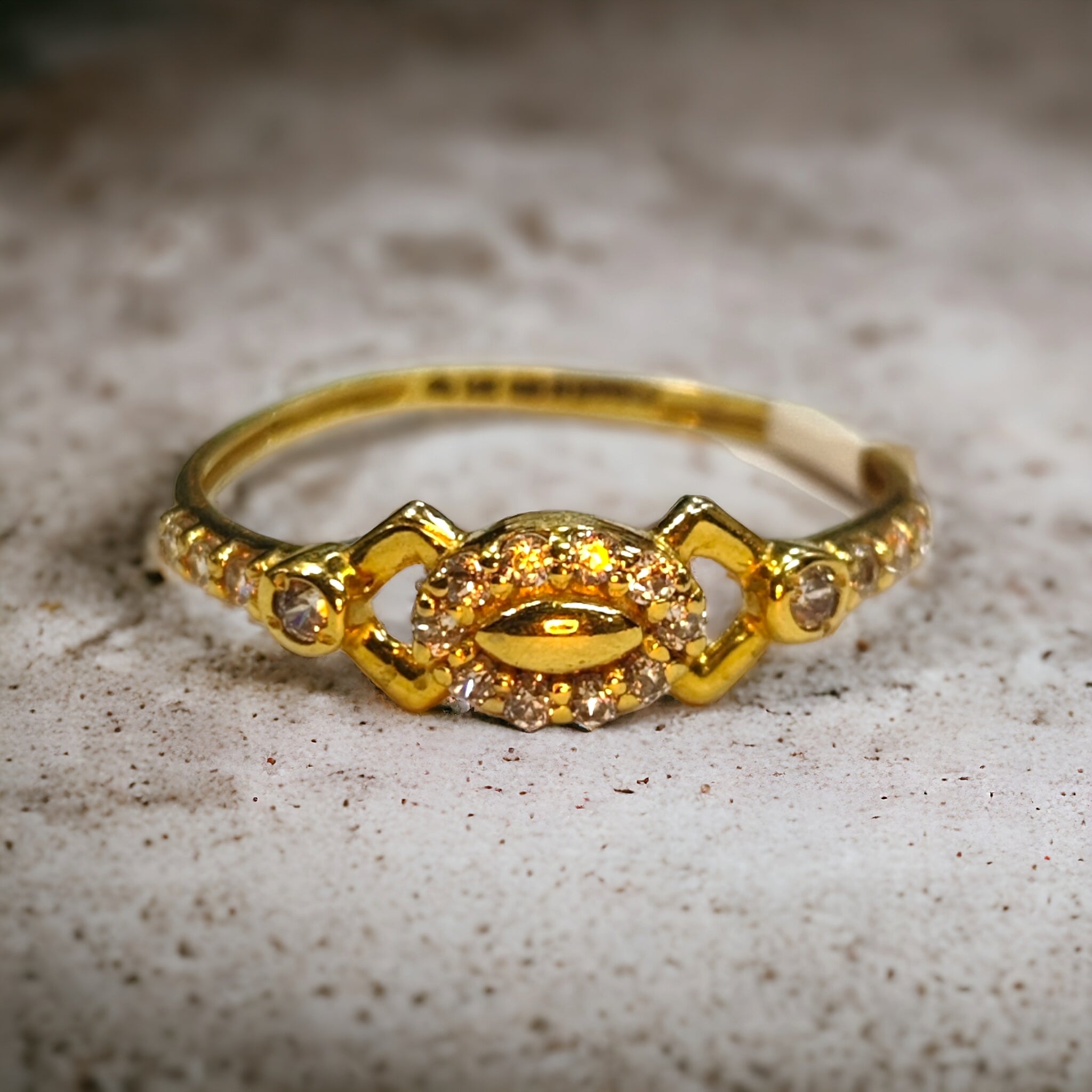 (GLFR14) TRJ (SIZE: 12) WGT: 0.900 GM APPROX 14KT HALLMARK GOLD RING FOR WOMEN 1 PIECE.