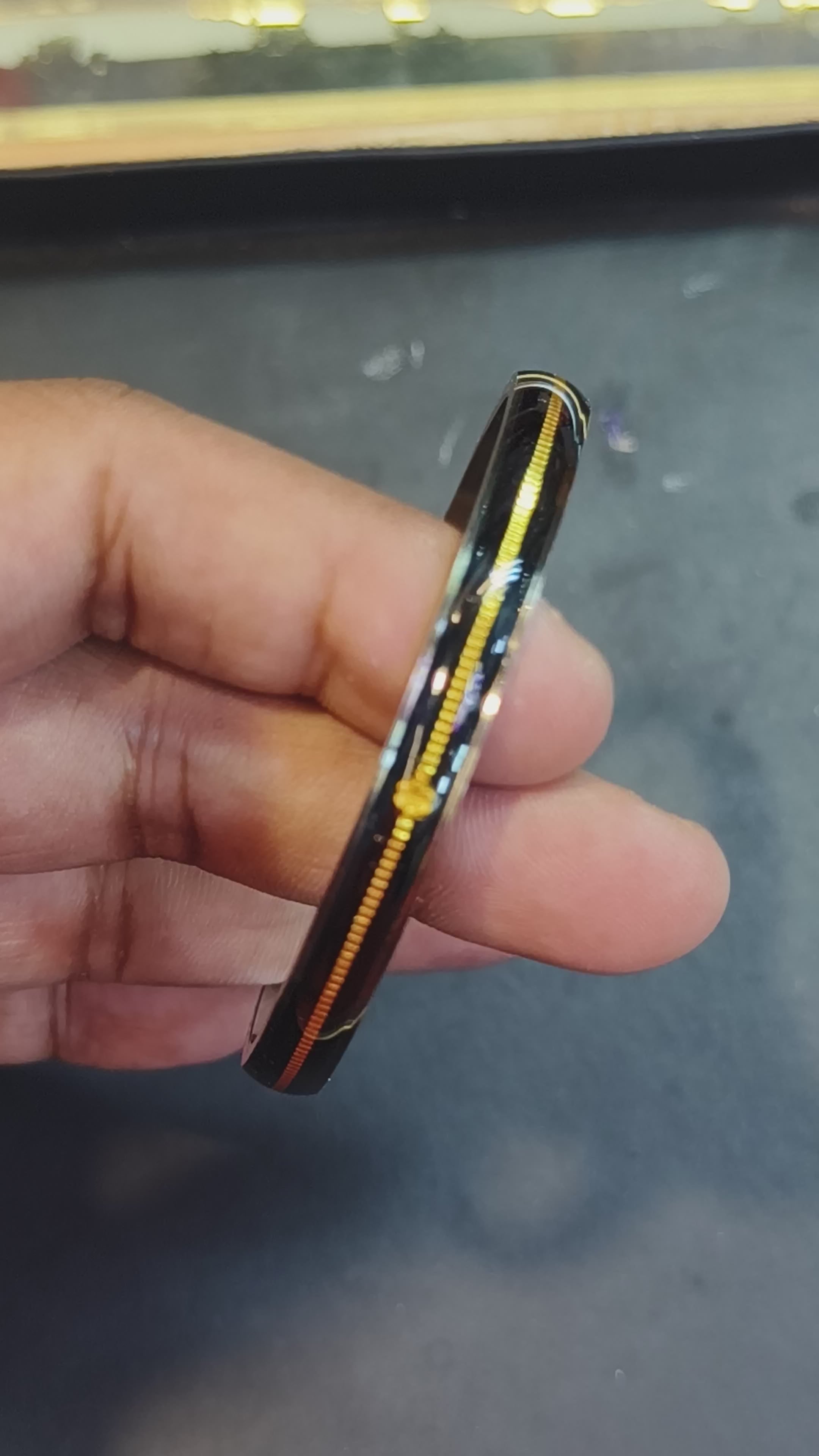 Load video: (FACEBOOK VIRAL) BLACK GLASS LAMINATED HUID HALLMARK 22KT GOLD NOA BANGLES VIRAL NOA 1 PIECE APP. WGT: 0.100 - 0.150 GM WITH PURITY CARD ( FUTURE EXCHANGE VALUE  RS 1000) WITH ANY JEWELLERY FOR LIFETIME