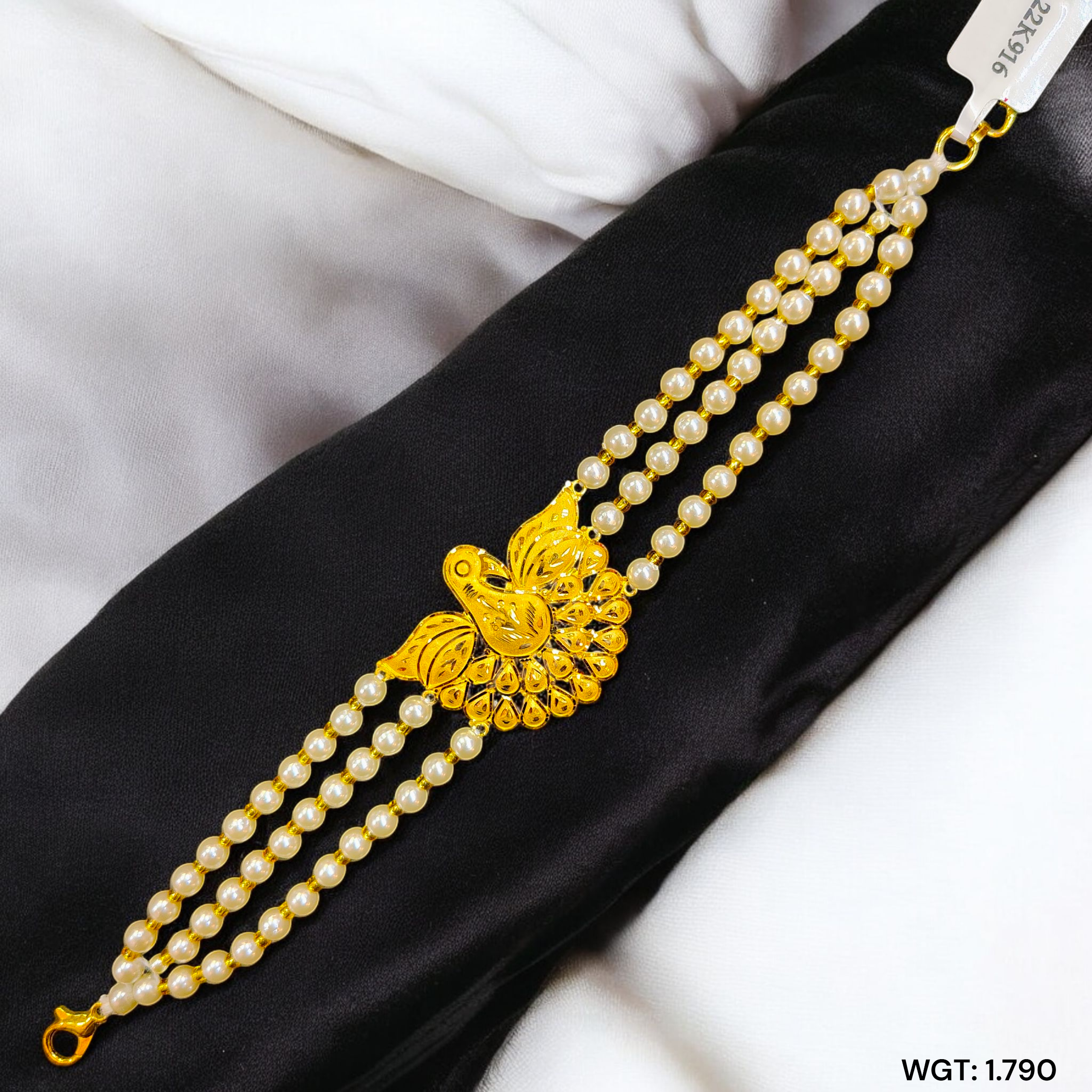 (GMW) RAJLAXMI WGT: 1.790 GM APPROX HUID HALLMARK 916 22KT GOLD MANTASHA WITH PEARL CHAIN FOR WOMEN.