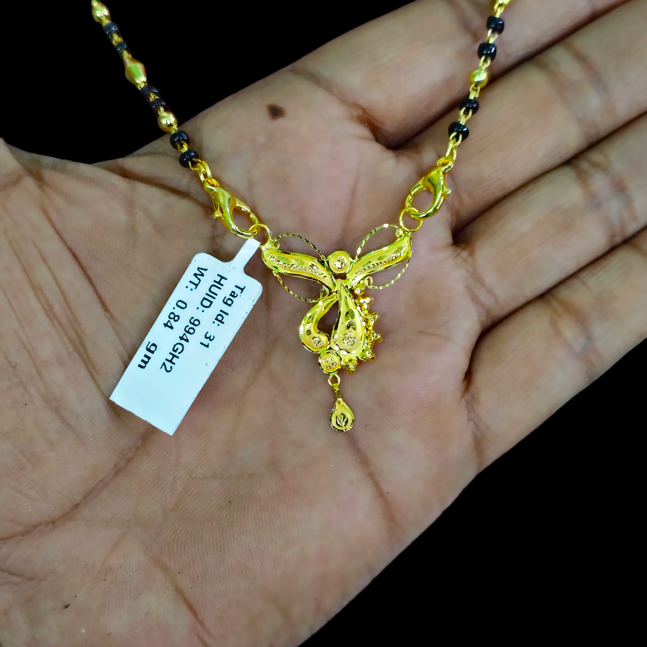 GOLD PENDANT- WGT: 0.840 GM APPROX 22KT HUID HALLMARK GOLD PENDANT MANGALSUTRA 1 PIECE WITH TASSEL.