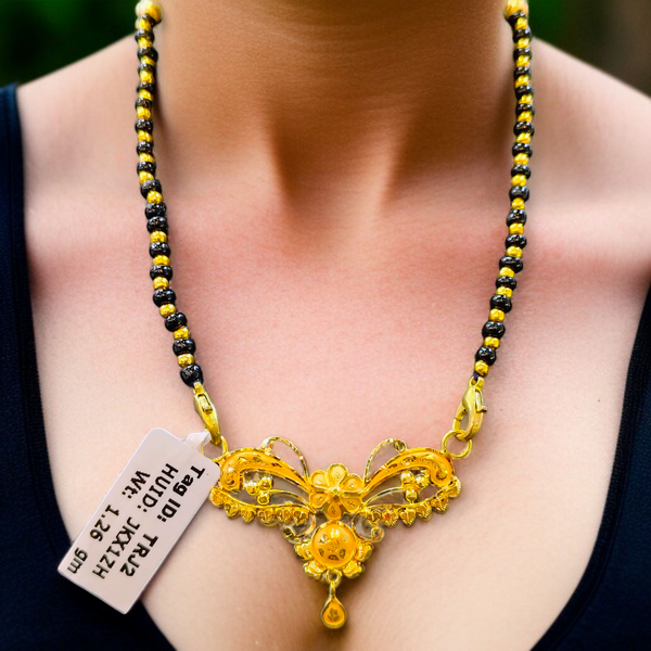 TRJ WGT: 1.260 GM APPROX 22KT HUID HALLMARK GOLD PENDANT MANGALSUTRA 1 PIECE WITH TASSEL.