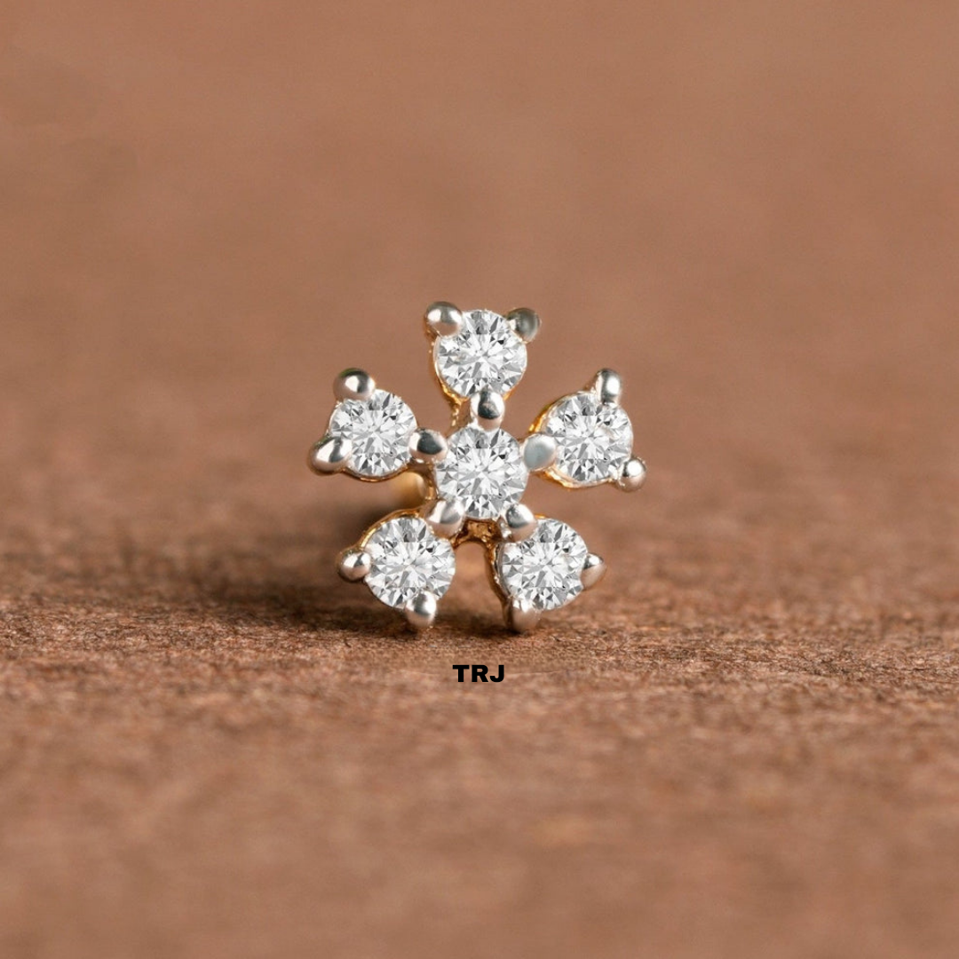 NOSEPIN- RAJLAXMI DIAMOND JEWELLERY - WGT: 0.215 GM - NATURAL DIAMOND (0.10 CENT) HUID HALLMARK 18KT DIAMOND NOSEPIN FOR WOMEN WITH CERTIFICATE OF AUTHENTICITY BY IGJI (DESIGN NO: M12082574).