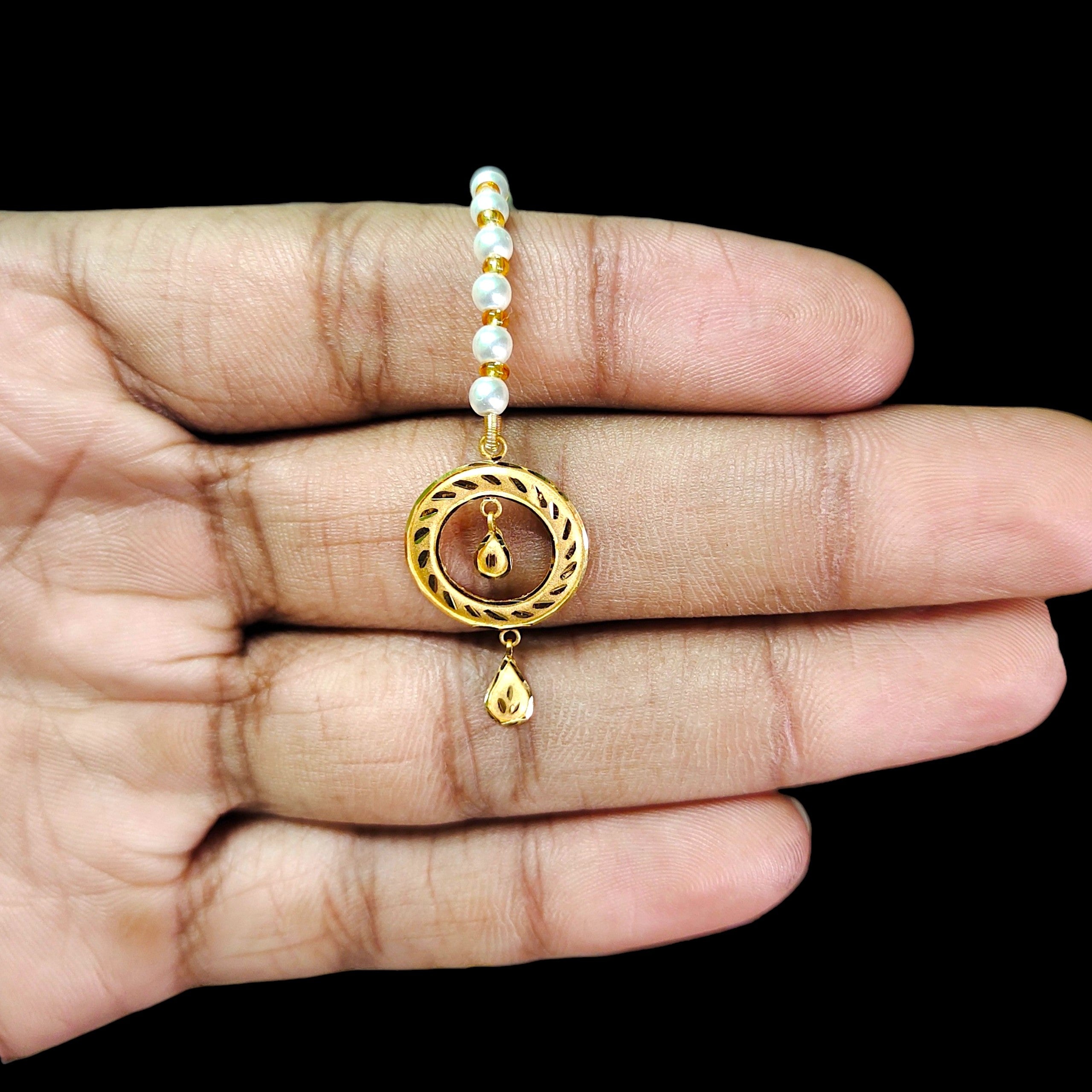 GOLD TICKLY- BIS CERTIFIED WGT: 0.440 GM APPROX HUID HALLMARK 916 22KT GOLD TICKLY (MANGTIKA) 1 PIECE FOR MARRIAGE.