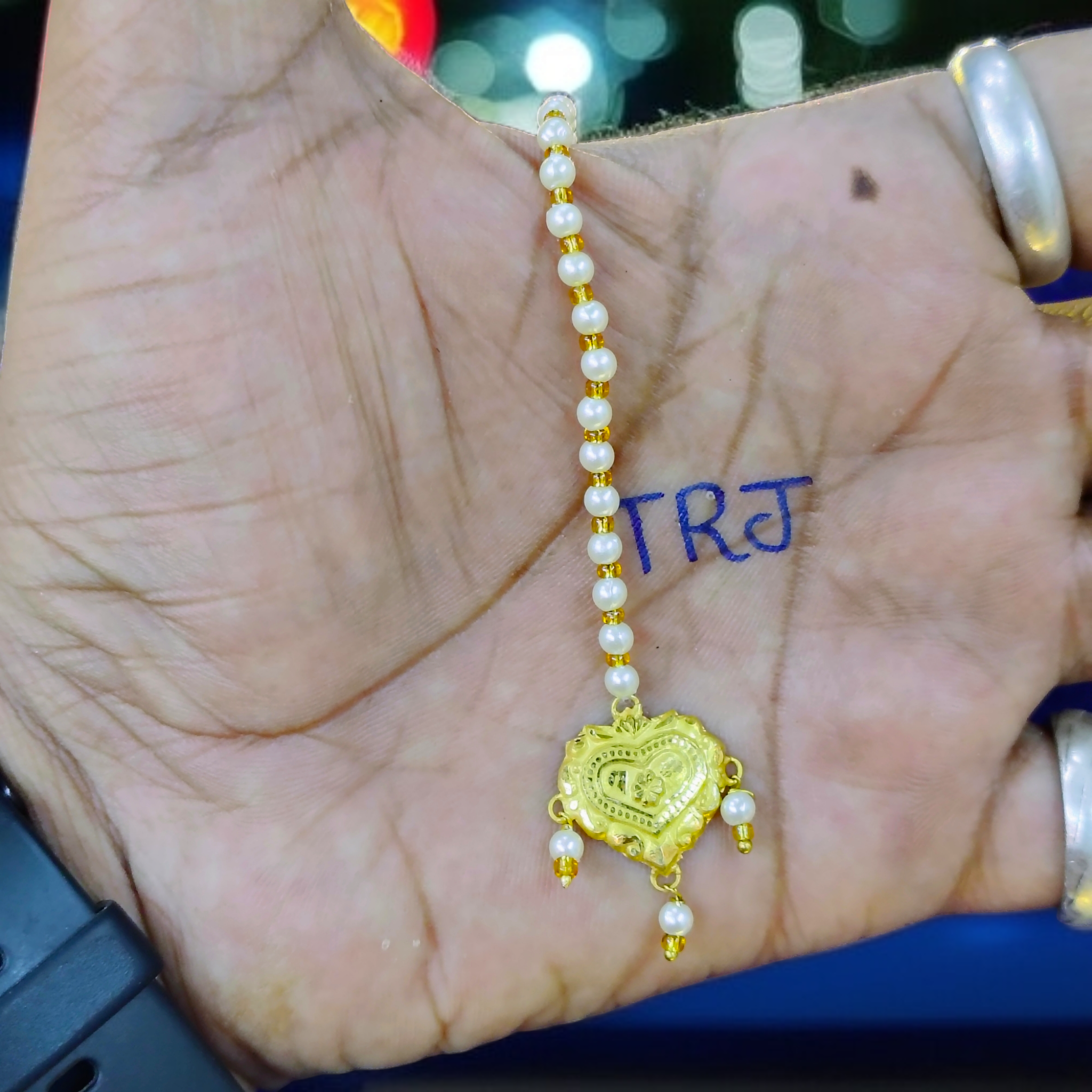 (GTMT) STAR LOVE DESIGN (WGT: 0.260 GM APPROX) KDM GOLD (MANGTIKA) MOTI TICKLY 1 PIECE (50 TONCH) BEST FOR GIFT IN MARRIAGE.