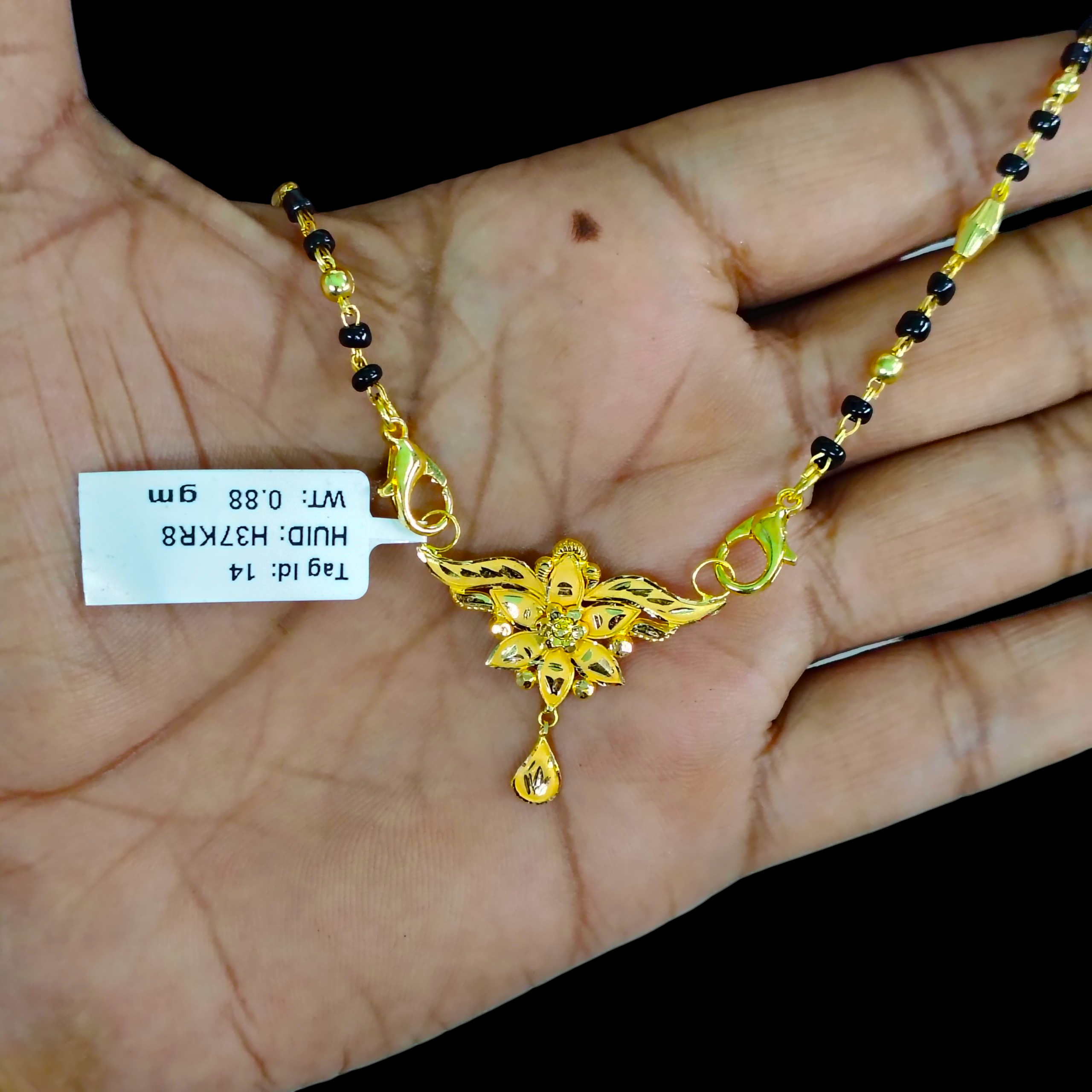 GOLD PENDANT- WGT: 0.880 GM APPROX 22KT HUID HALLMARK GOLD PENDANT MANGALSUTRA 1 PIECE WITH TASSEL.