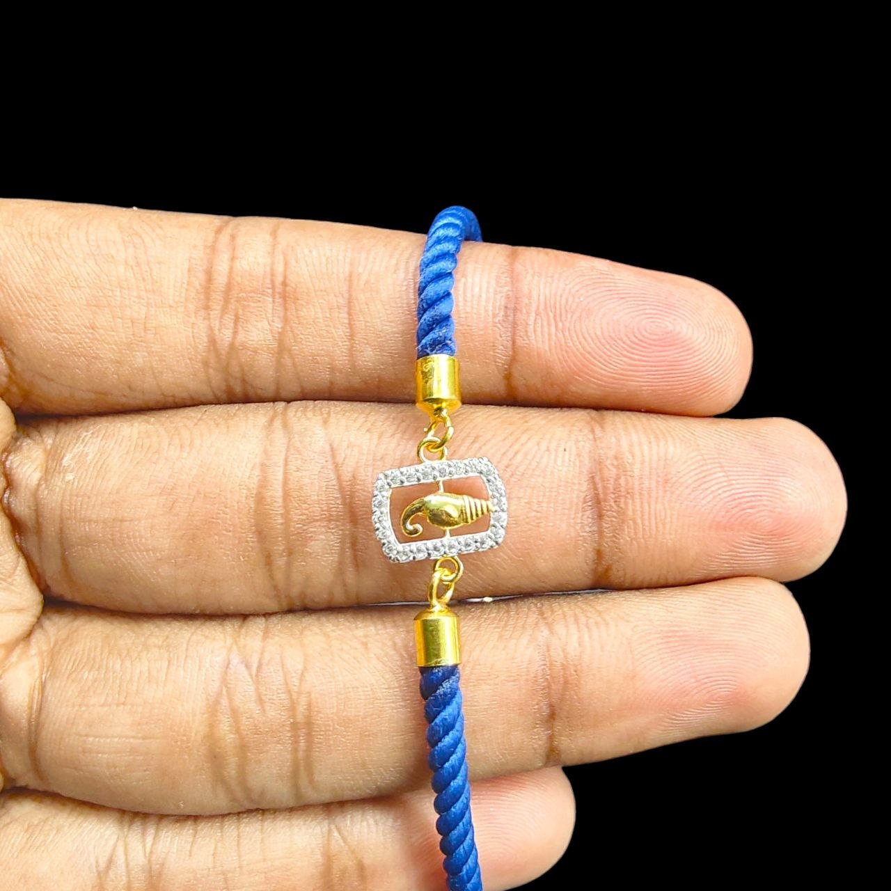 RAKHI- (WGT: 0.420 GM APPROX) BIS CERTIFIED HUID HALLMARK 375 9KT GOLD RAKHI FOR YOUR BELOVED BROTHER (ADJUSTABLE SIZE).