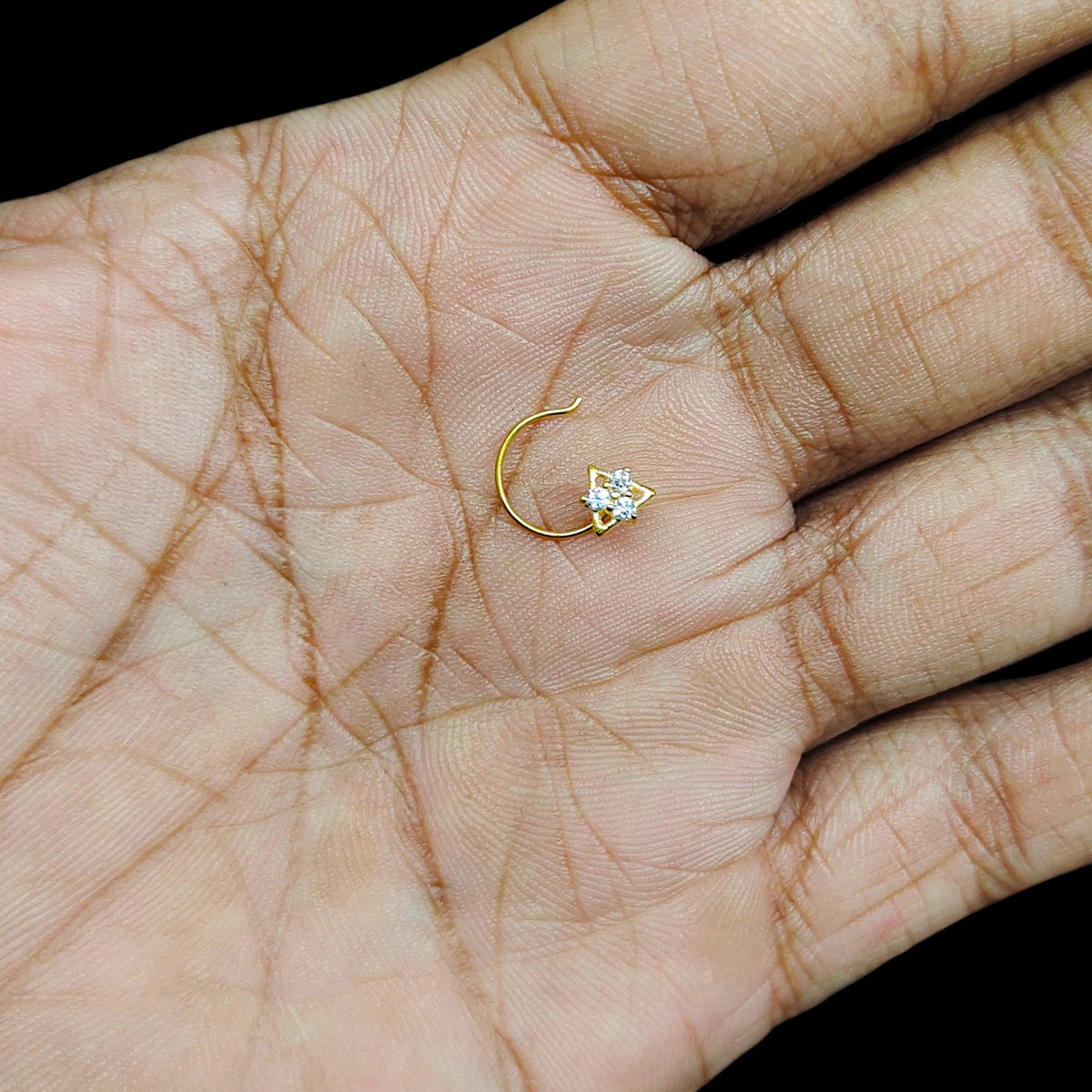 GOLD NOSEPIN- (WGT: 0.210 GM APPROX) BIS CERTIFIED HUID HALLMARK 375 9KT GOLD NOSEPIN 1 PIECE FOR WOMEN (FOR REGULAR USE). SOLD ON MRP.