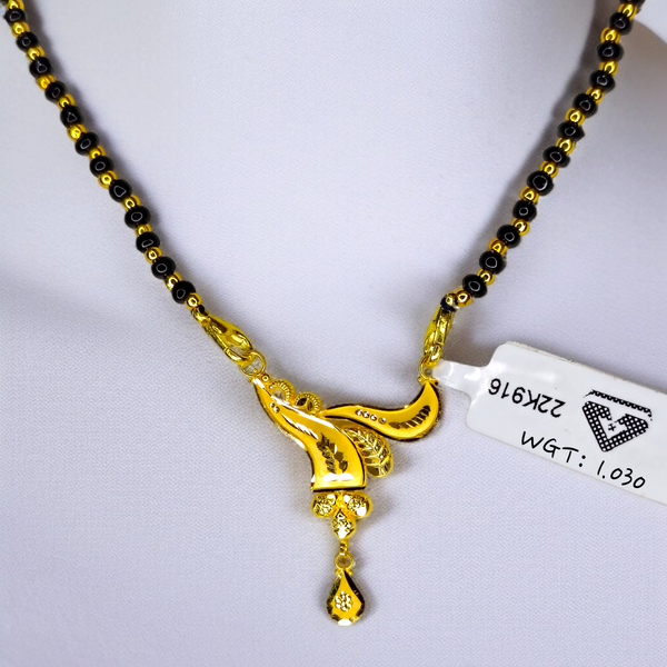 TRJ WGT: 1.030 GM APPROX 22KT HUID HALLMARK GOLD PENDANT MANGALSUTRA 1 PIECE WITH TASSEL.