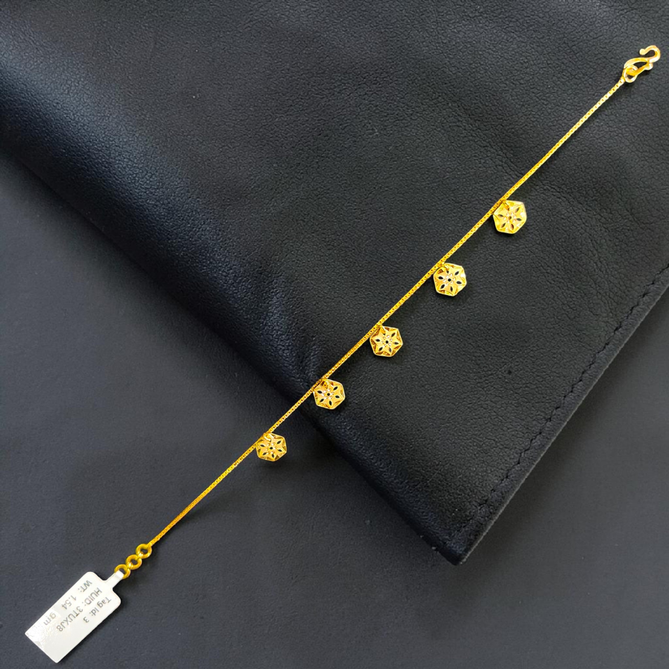 GOLD WRISTLET- 7.5" BIS CERTIFIED HUID HALLMARK 375 9KT GOLD WRISTLET APPROX WGT: 1.540 FOR WOMEN.