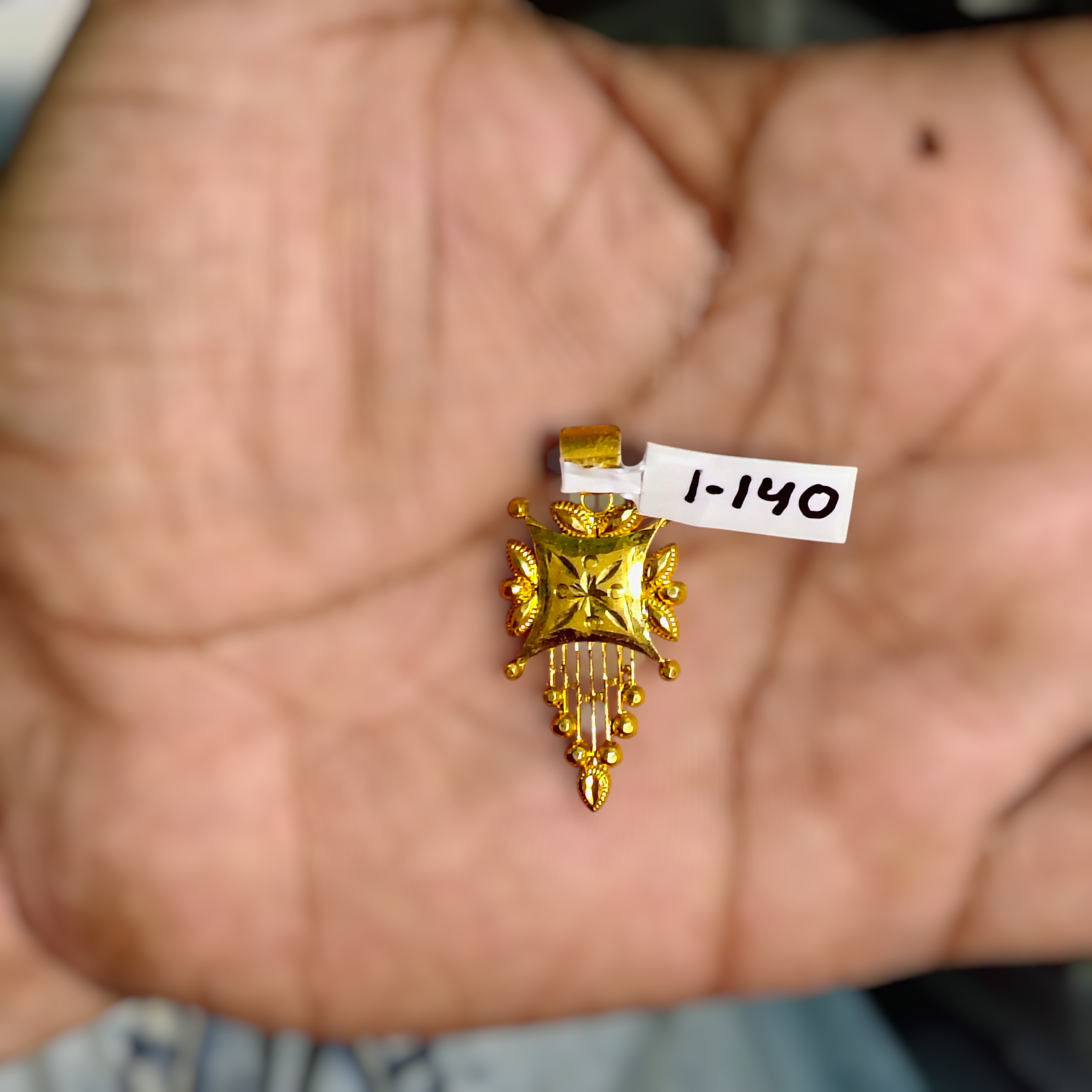 (GLKD) LOCKET WGT: 1.140 GM APPROX KDM GOLD LOCKET 1 PIECE (50 TONCH) WITH ADJUSTABLE TASSEL FOR GIFTING PURPOSE (CHAIN NOT INCLUDED).