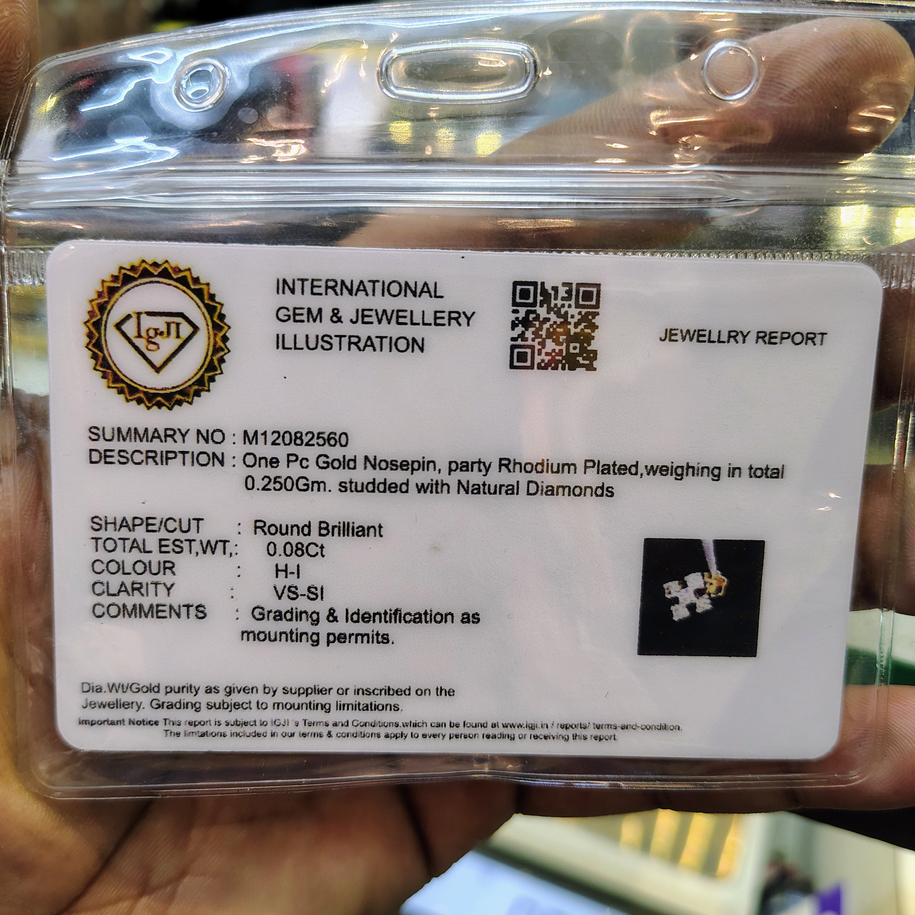 (GNP) RAJLAXMI DIAMOND JEWELLERY - WGT: 0.250 GM - NATURAL DIAMOND (0.08 CENT) HUID HALLMARK 18KT DIAMOND NOSEPIN FOR WOMEN WITH CERTIFICATE OF AUTHENTICITY BY IGJI (DESIGN NO: M12082560).