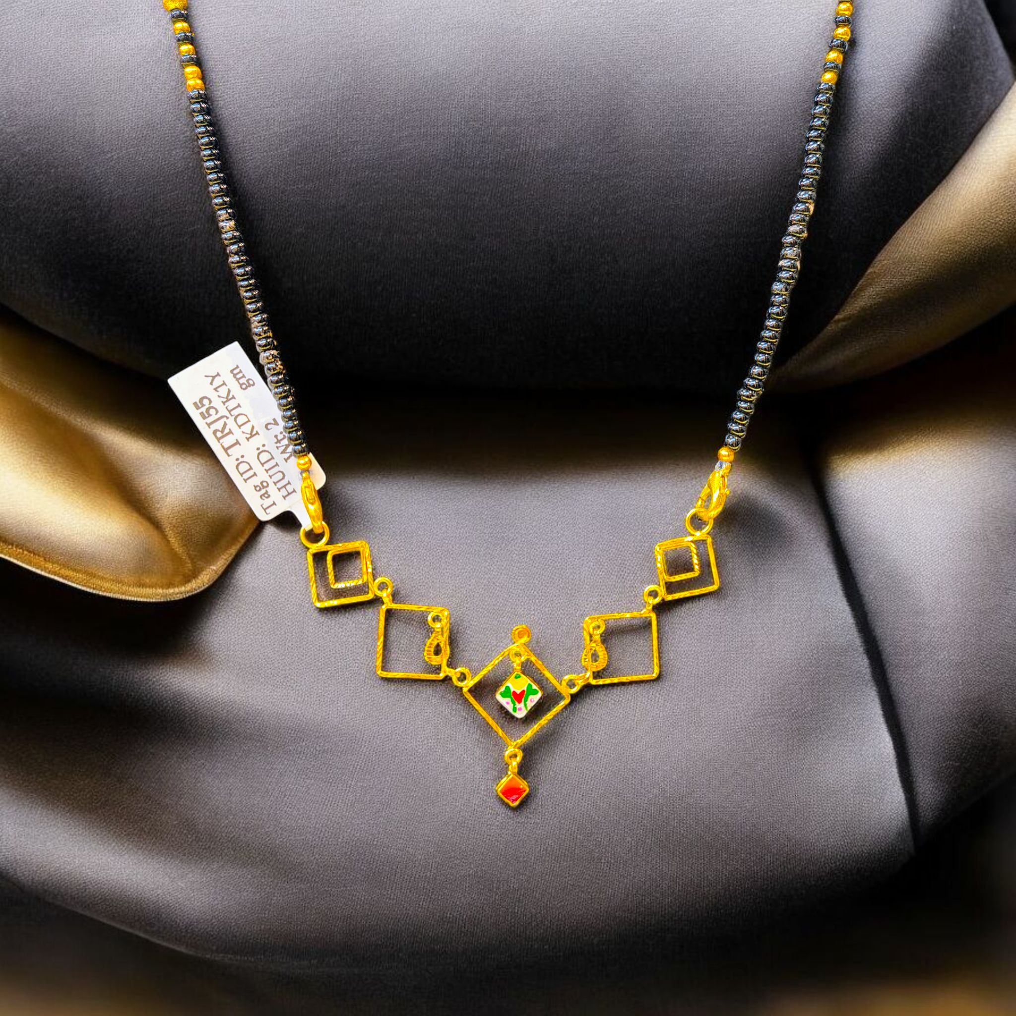 (GPM) TRJ WGT: 2.00 GM APPROX 22KT HUID HALLMARK GOLD PENDANT 1 PIECE WITH ADJUSTABLE TASSEL.