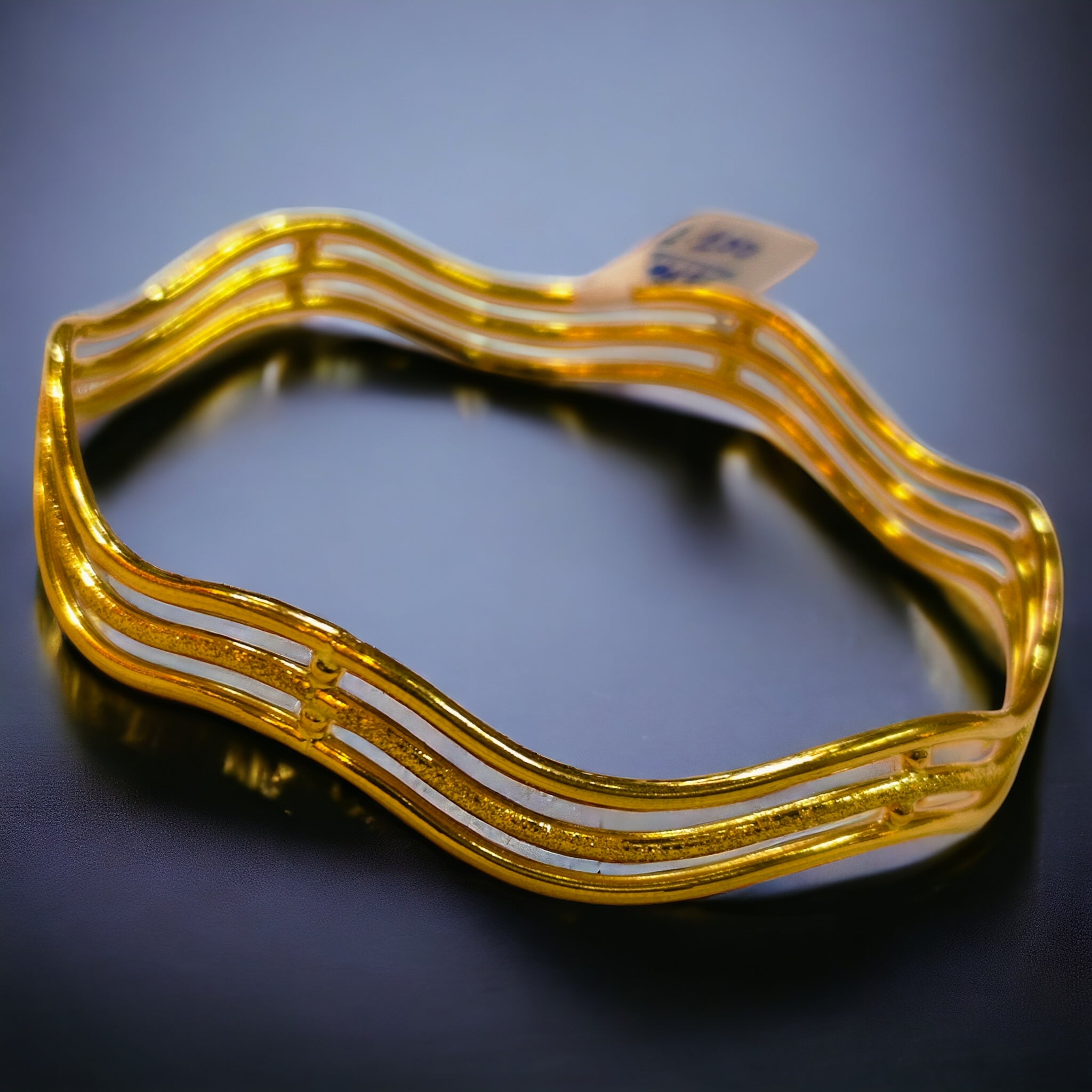 TRJ MTO (GCB) DUPLEX WAVE DESIGN HALLMARK 22KT GOLD COVER BANGLE 1 PIECE APPROX WGT: 2.100 GM FOR WOMEN - (BILL MANDATORY -EXCHANGE FOR LIFETIME IN STORE ONLY).