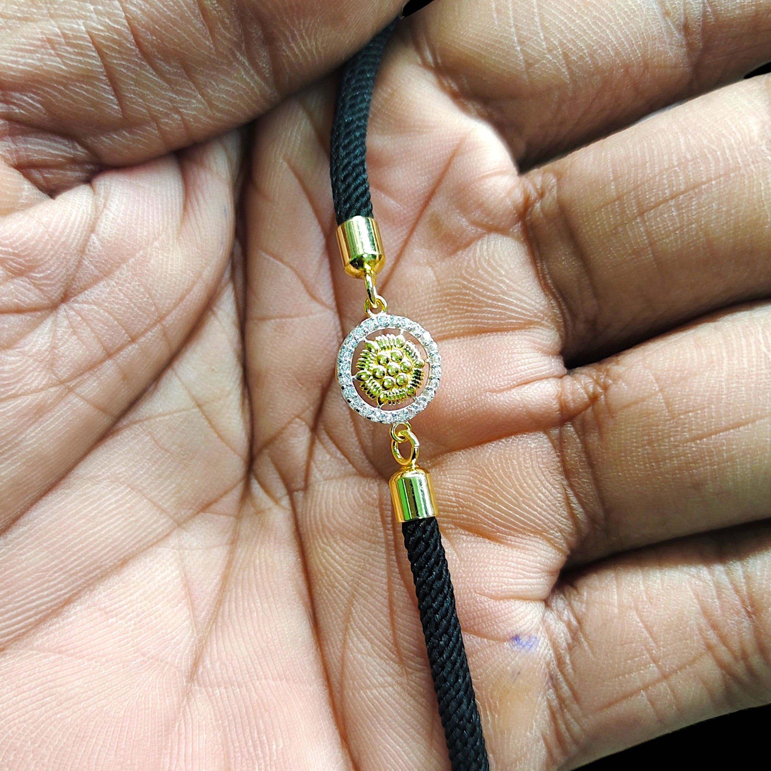RAKHI- (WGT: 0.340 GM APPROX) BIS CERTIFIED HUID HALLMARK 375 9KT GOLD RAKHI FOR YOUR BELOVED BROTHER (ADJUSTABLE SIZE).