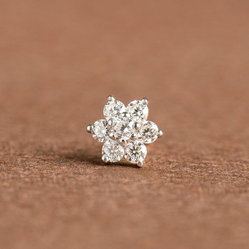 NOSEPIN- RAJLAXMI DIAMOND JEWELLERY - WGT: 0.205 GM - NATURAL DIAMOND (0.05 CENT) HUID HALLMARK 18KT DIAMOND NOSEPIN FOR WOMEN WITH CERTIFICATE OF AUTHENTICITY BY IGJI (DESIGN NO: M12082567).