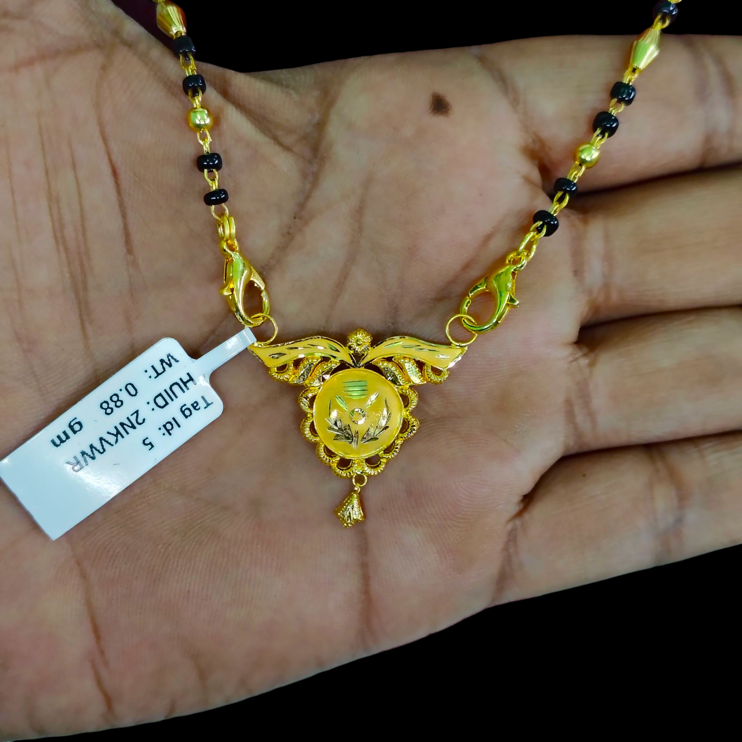 GOLD PENDANT- WGT: 0.880 GM APPROX 22KT HUID HALLMARK GOLD PENDANT MANGALSUTRA 1 PIECE WITH TASSEL.
