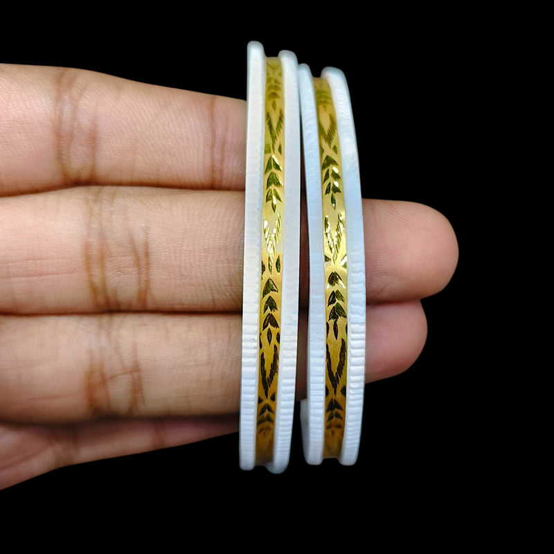 GSB9K- (VSX93G)-(7UP6B3) (SIZE:27) (WGT: 1.110 GM APPROX) BIS CERTIFIED HUID HALLMARK 375 9KT GOLD SAKHA BADHANO 1 PAIR FOR WOMEN (CHILA PATH DESIGN) NOT FOR REGULAR USE.