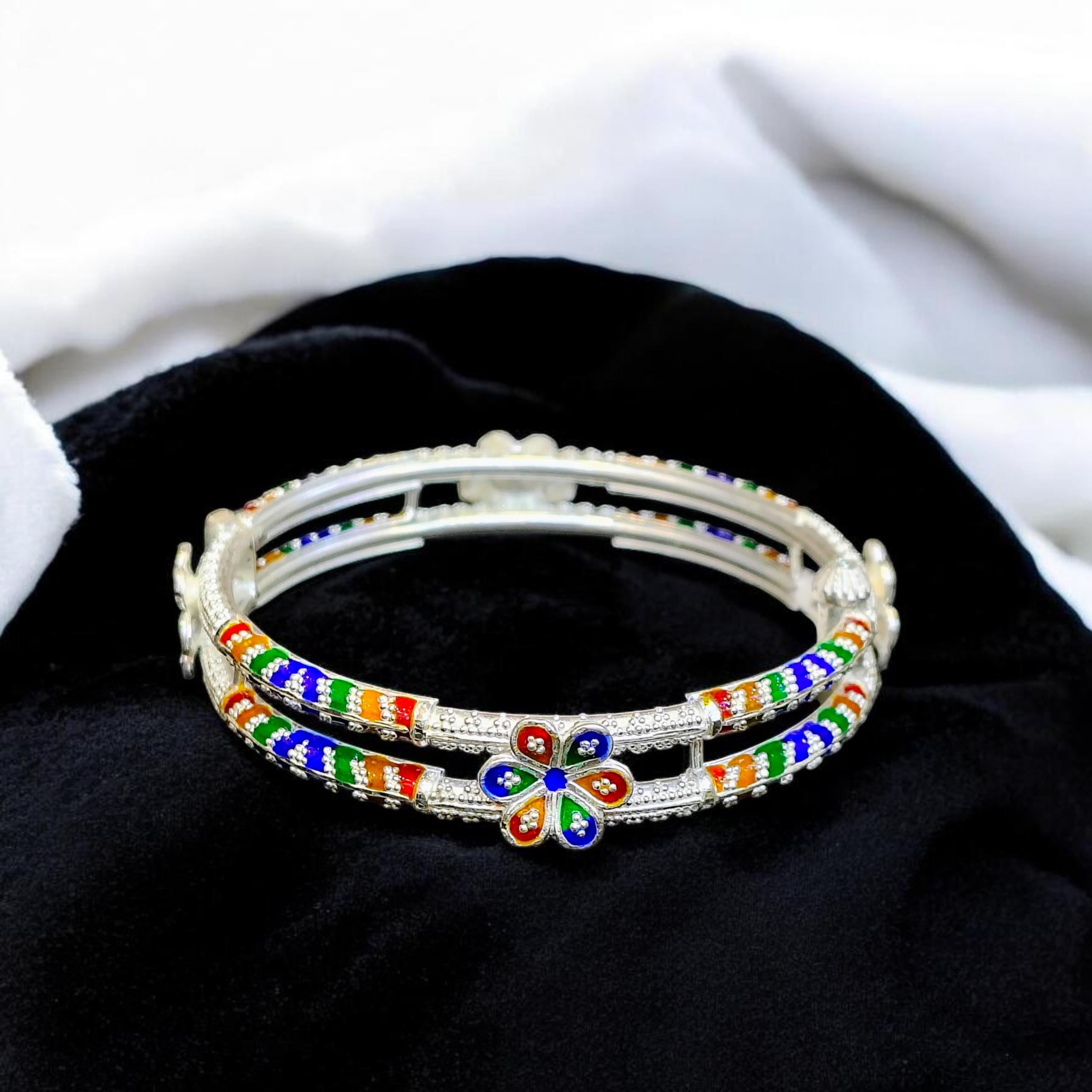 LUXURY SILVER BANGLE- (SIZE 25 KHILEN) CERTIFIED BIS HALLMARK 925 SILVER BANGLE (MANIPUR DESIGN) APPROX WGT: 23.350 GM (1 PIECE) FOR REGULAR USE FOR WOMEN.