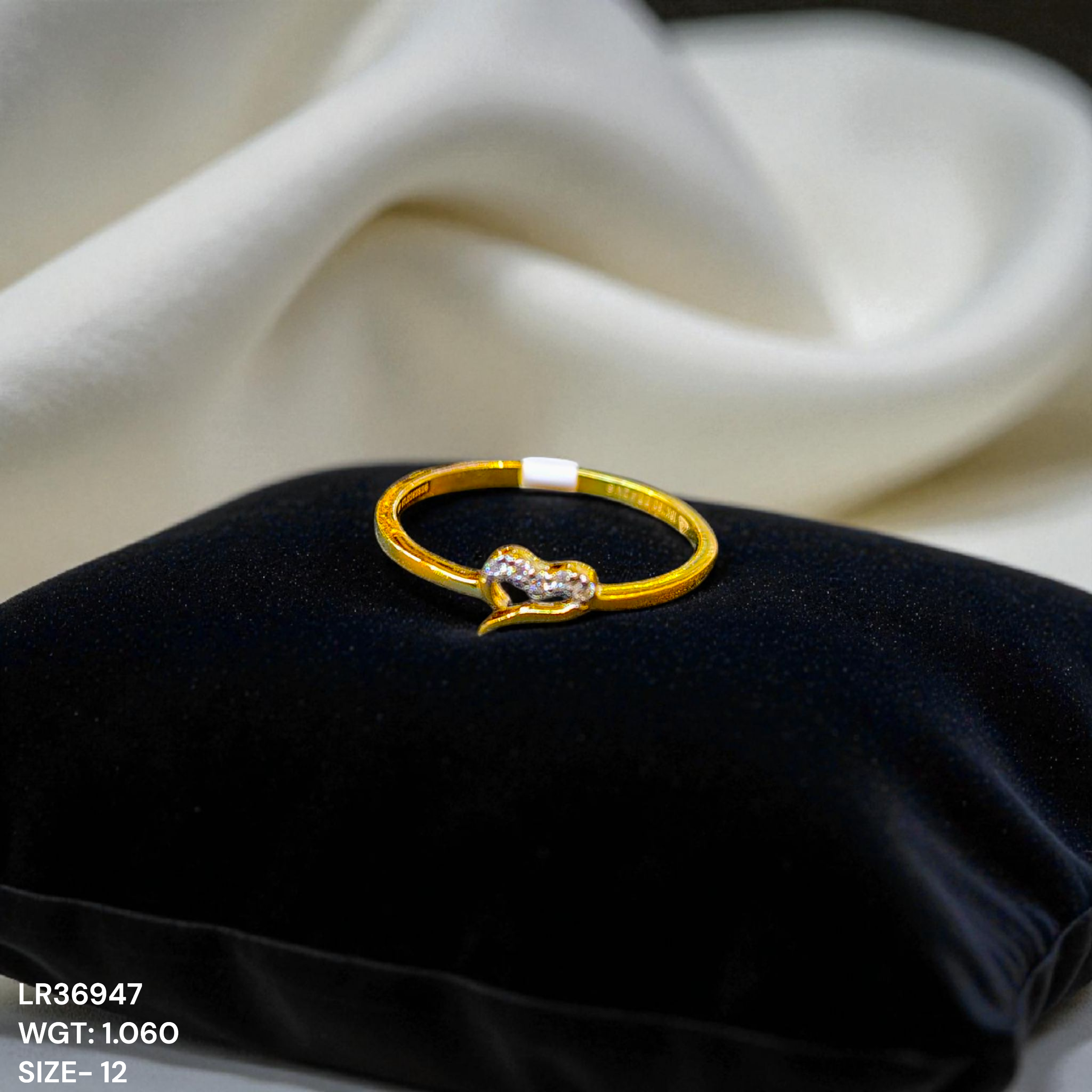 (GLFR18) RAJLAXMI DIAMOND JEWELLERY (SIZE:12) - WGT: 1.060 GM - NATURAL DIAMOND (0.02 CENT) HUID HALLMARK 18KT DIAMOND FINGER RING FOR WOMEN WITH CERTIFICATE OF AUTHENTICITY BY ZORBA (DESIGN NO: LR36947).