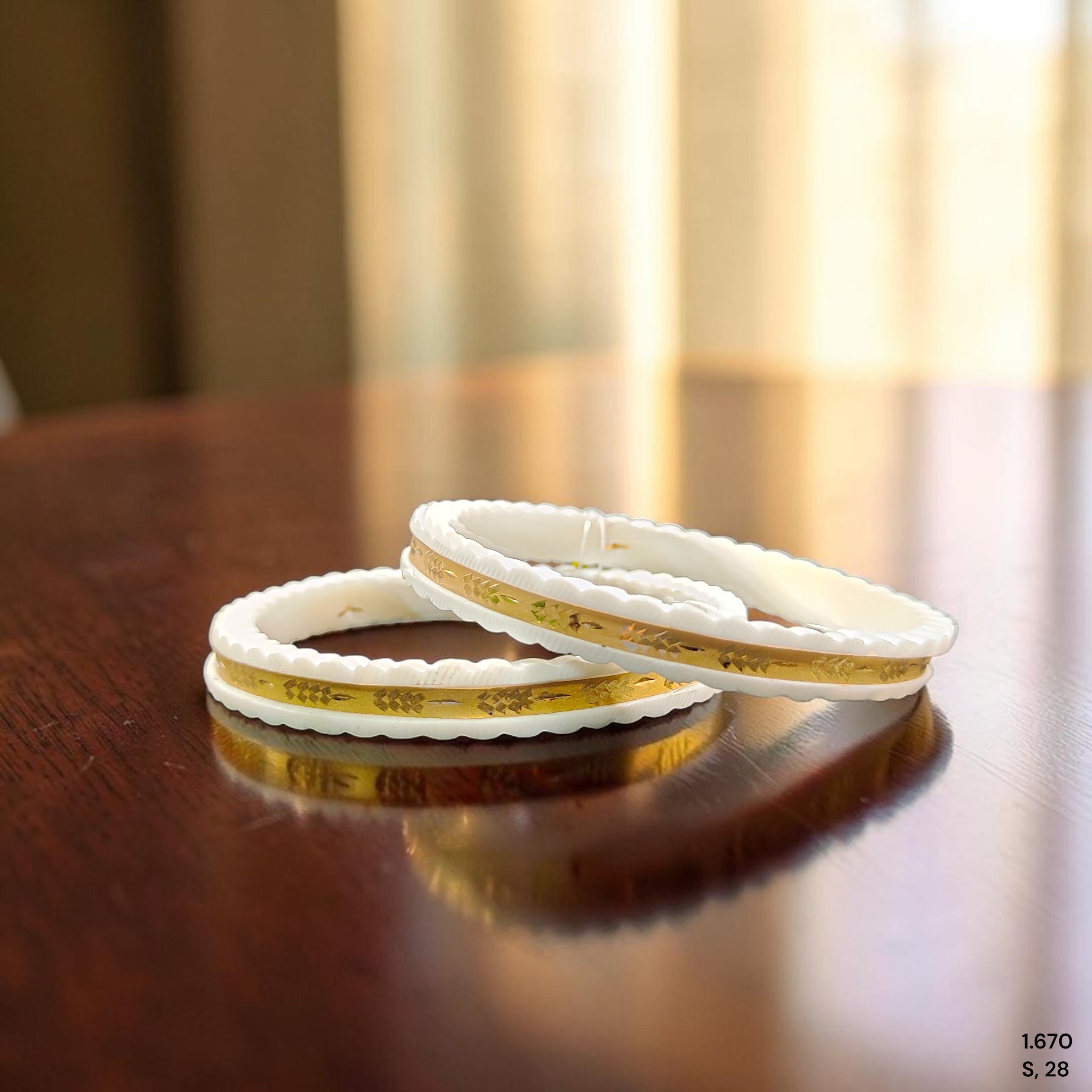 SAKHA BADHANO- (SIZE:28) WGT: 1.670 GM APPROX HUID HALLMARK 22KT GOLD SAKHA BADHANO BANGLES 1 PAIR DESIGN FOR REGULAR USE.