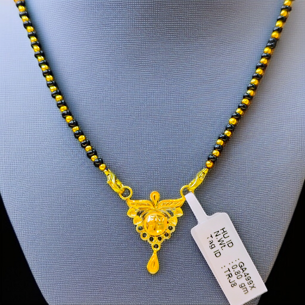 TRJ WGT: 0.800 GM APPROX 22KT HUID HALLMARK GOLD PENDANT MANGALSUTRA 1 PIECE WITH TASSEL.