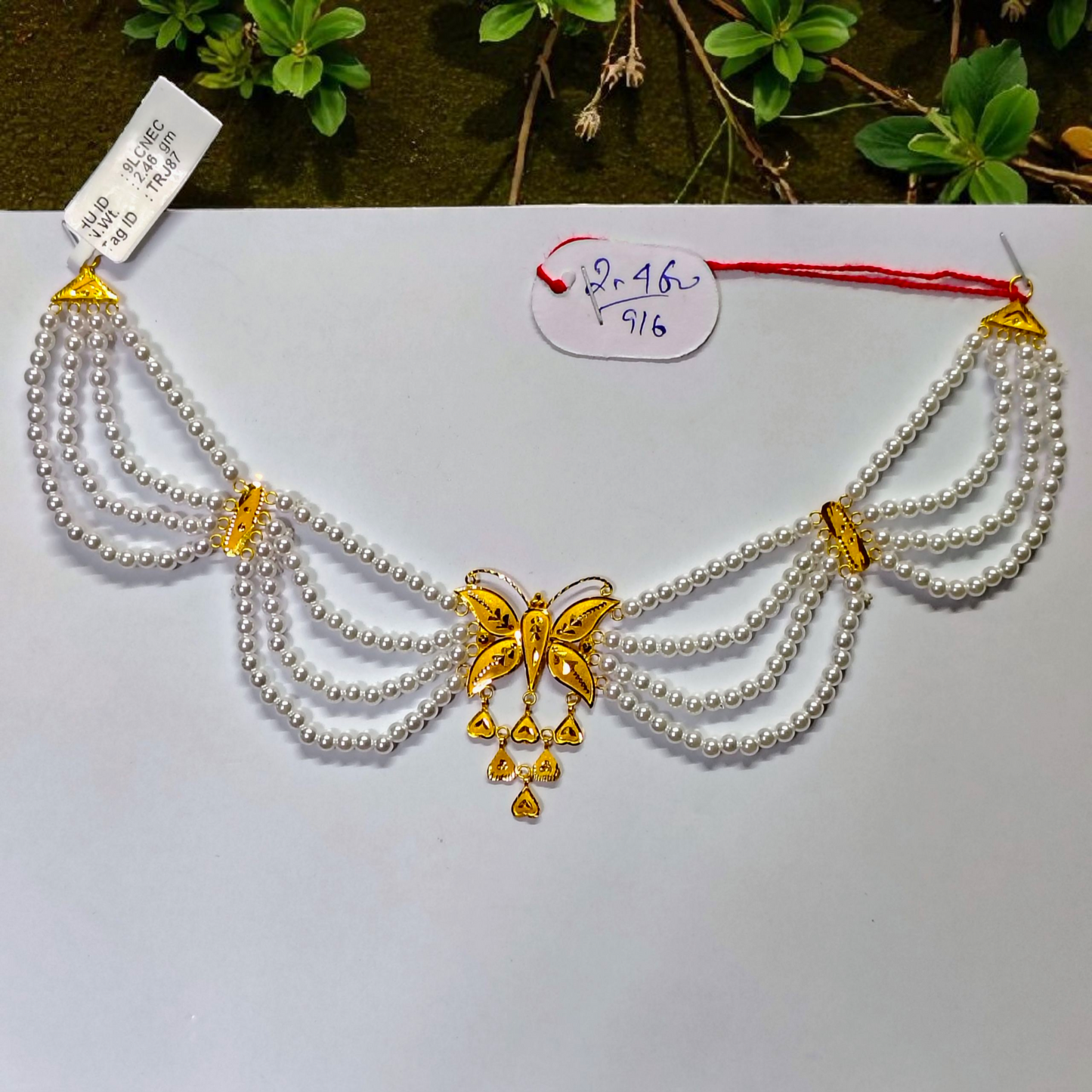 RAJLAXMI WGT: 2.460 GM APPROX HUID HALLMARK 22KT GOLD MOTI NECKLACE 1 PIECE WITH ADJUSTABLE TASSEL.