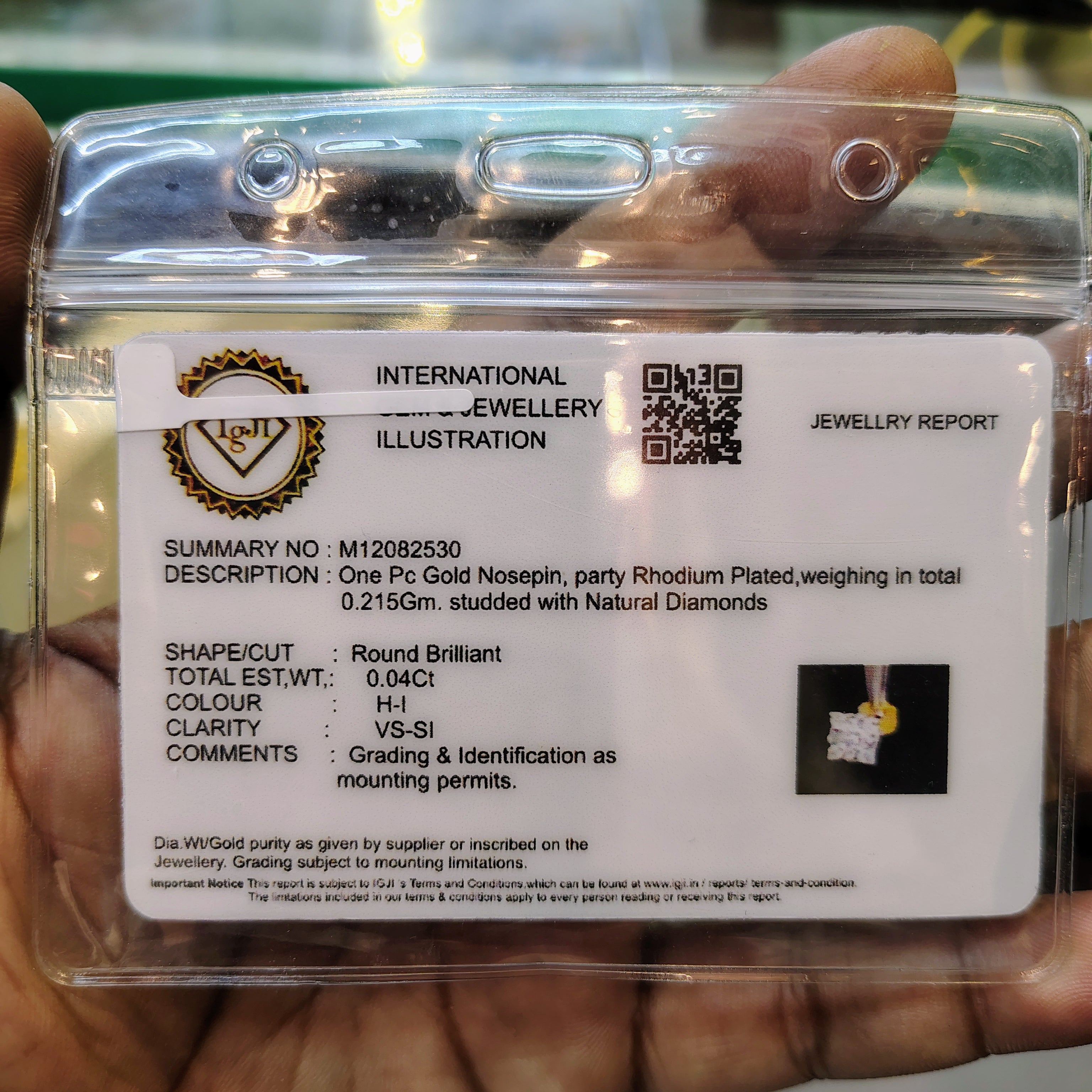 (GNP) RAJLAXMI DIAMOND JEWELLERY - WGT: 0.215 GM - NATURAL DIAMOND (0.04 CENT) HUID HALLMARK 18KT DIAMOND NOSEPIN FOR WOMEN WITH CERTIFICATE OF AUTHENTICITY BY IGJI (DESIGN NO: M12082530).