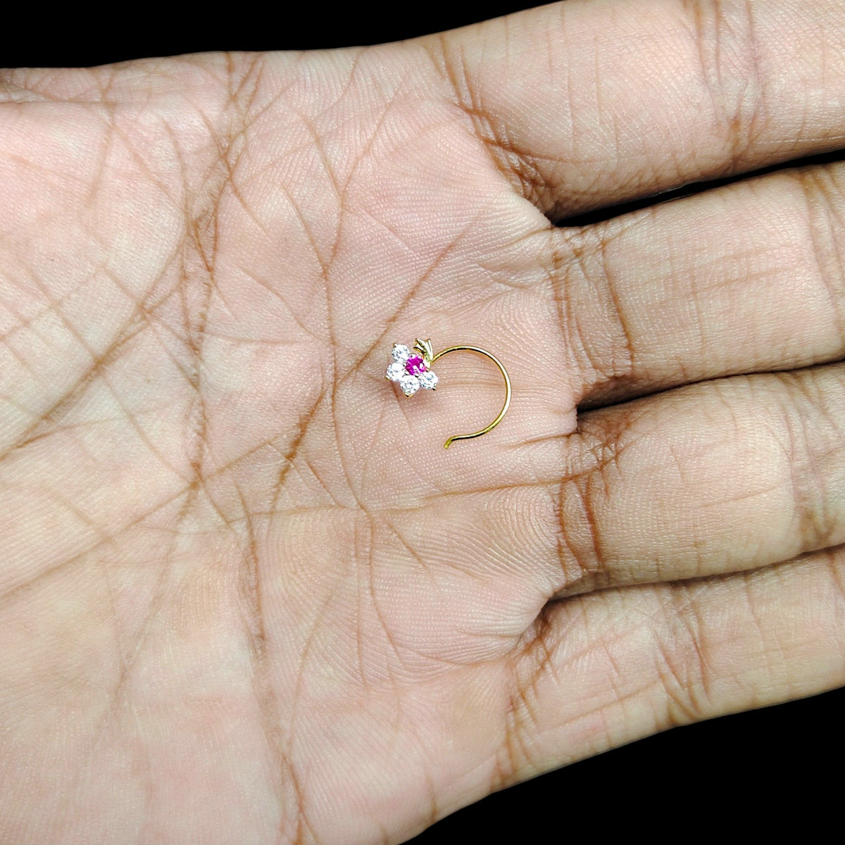GOLD NOSEPIN- (WGT: 0.170 GM APPROX) BIS CERTIFIED HUID HALLMARK 375 9KT GOLD NOSEPIN 1 PIECE FOR WOMEN (FOR REGULAR USE). SOLD ON MRP.