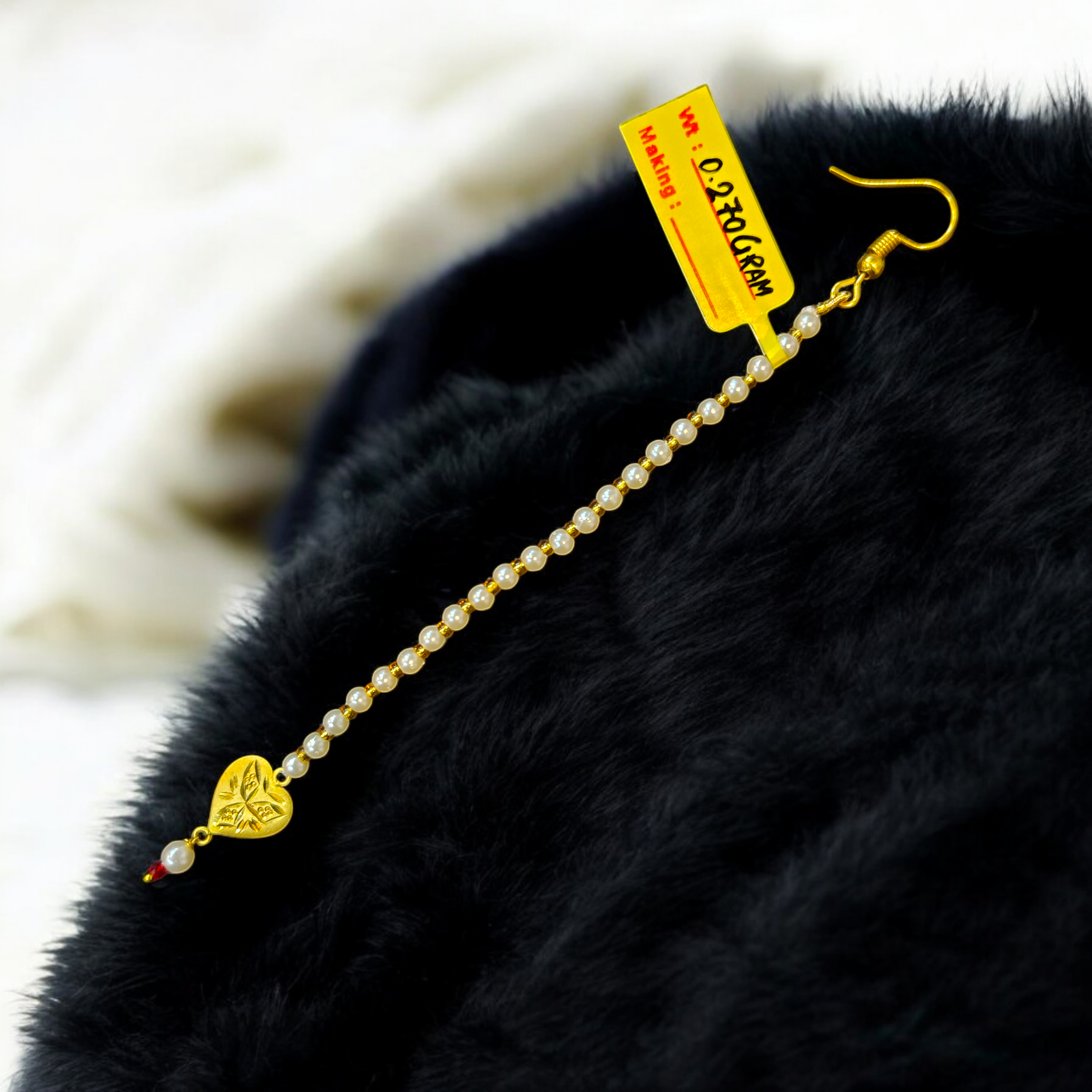 (GTMT) TRJ WGT: 0.270 GM APPROX 18KT HUID HALLMARK GOLD TICKLY (MANGTIKA) 1 PIECE FOR MARRIAGE.