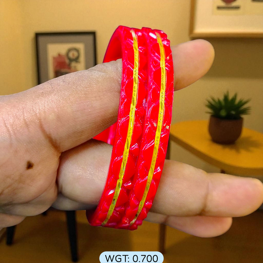 (GSP) TRJ WGT: 0.700 GM APPROX 22KT HUID HALLMARK GOLD POLA BANGLES 1 PAIR DESIGN FOR REGULAR USE.