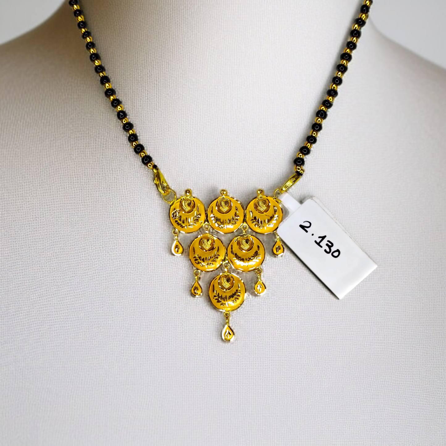 TRJ WGT: 2.130 GM APPROX 22KT HUID HALLMARK GOLD PENDANT MANGALSUTRA 1 PIECE WITH TASSEL.