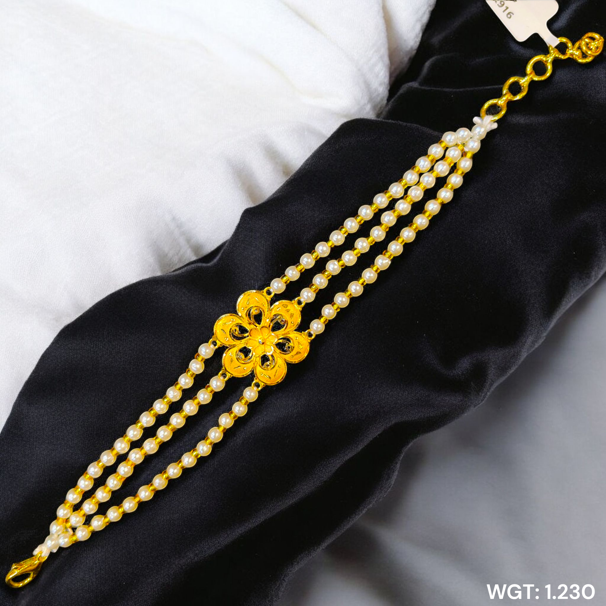 (GMW) RAJLAXMI WGT: 1.230 GM APPROX HUID HALLMARK 916 22KT GOLD MANTASHA WITH PEARL CHAIN FOR WOMEN.