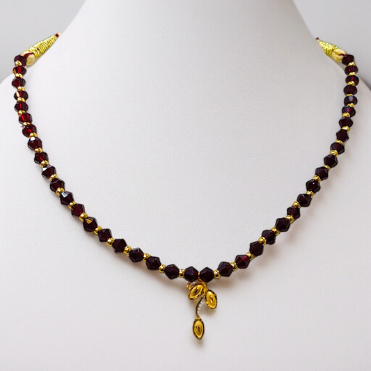 TRJ WGT: 0.160 GM APPROX KDM GOLD LEAF DESIGN LOCKET 1 PIECE WITH MAROON CRYSTAL ADJUSTABLE TASSEL FOR GIFT PURPOSE (50 TONCH).