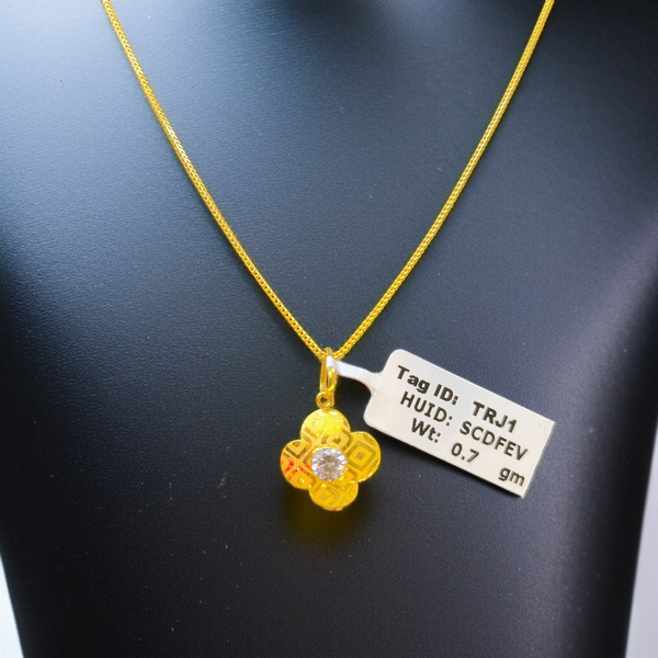 TRJ WGT: 0.700 GM APPROX 18KT HUID HALLMARK GOLD LOCKET 1 PIECE WITH ADJUSTABLE TASSEL.