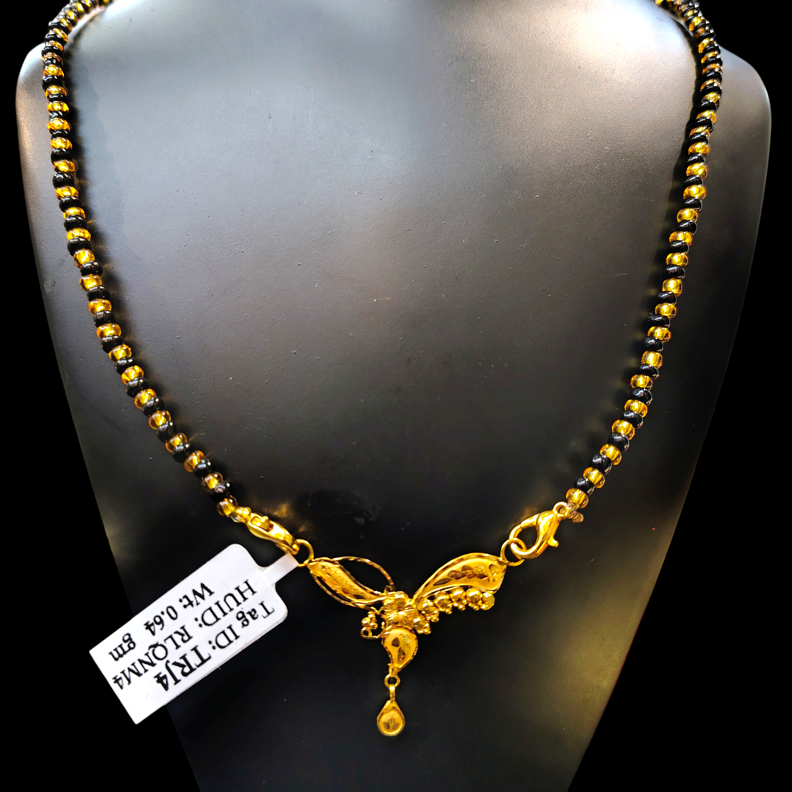 GOLD PENDANT- WGT: 0.640 GM APPROX 22KT HUID HALLMARK GOLD PENDANT MANGALSUTRA 1 PIECE WITH TASSEL.
