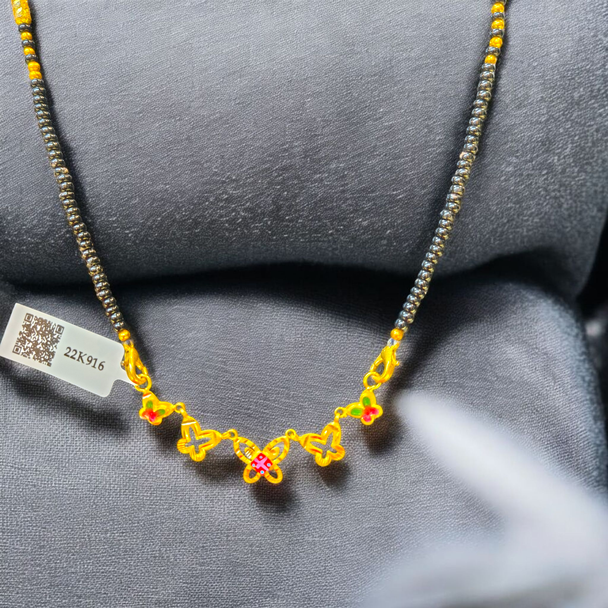 (GPM) TRJ WGT: 1.340 GM APPROX 22KT HUID HALLMARK GOLD PENDANT 1 PIECE WITH ADJUSTABLE TASSEL.