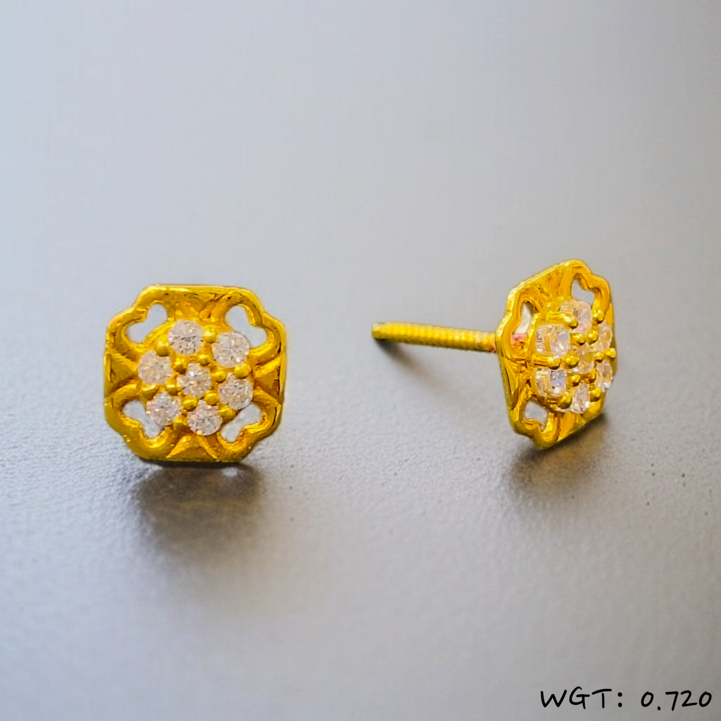 (GPT) TRJ WGT: 0.720 GM APPROX 14KT HUID HALLMARK GOLD EAR STUD 1 PAIR FOR REGULAR USE.