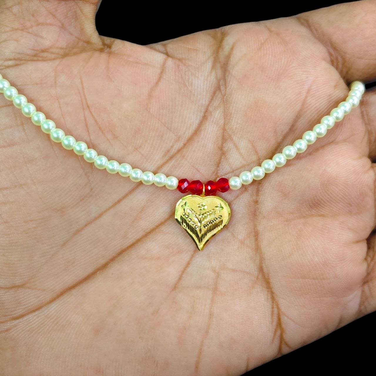 GOLD LOCKET- (WGT: 0.220 GM APPROX) BIS CERTIFIED HUID HALLMARK 9KT GOLD LOCKET 1 PIECE FOR WOMEN (WITH MOTI CHAIN).