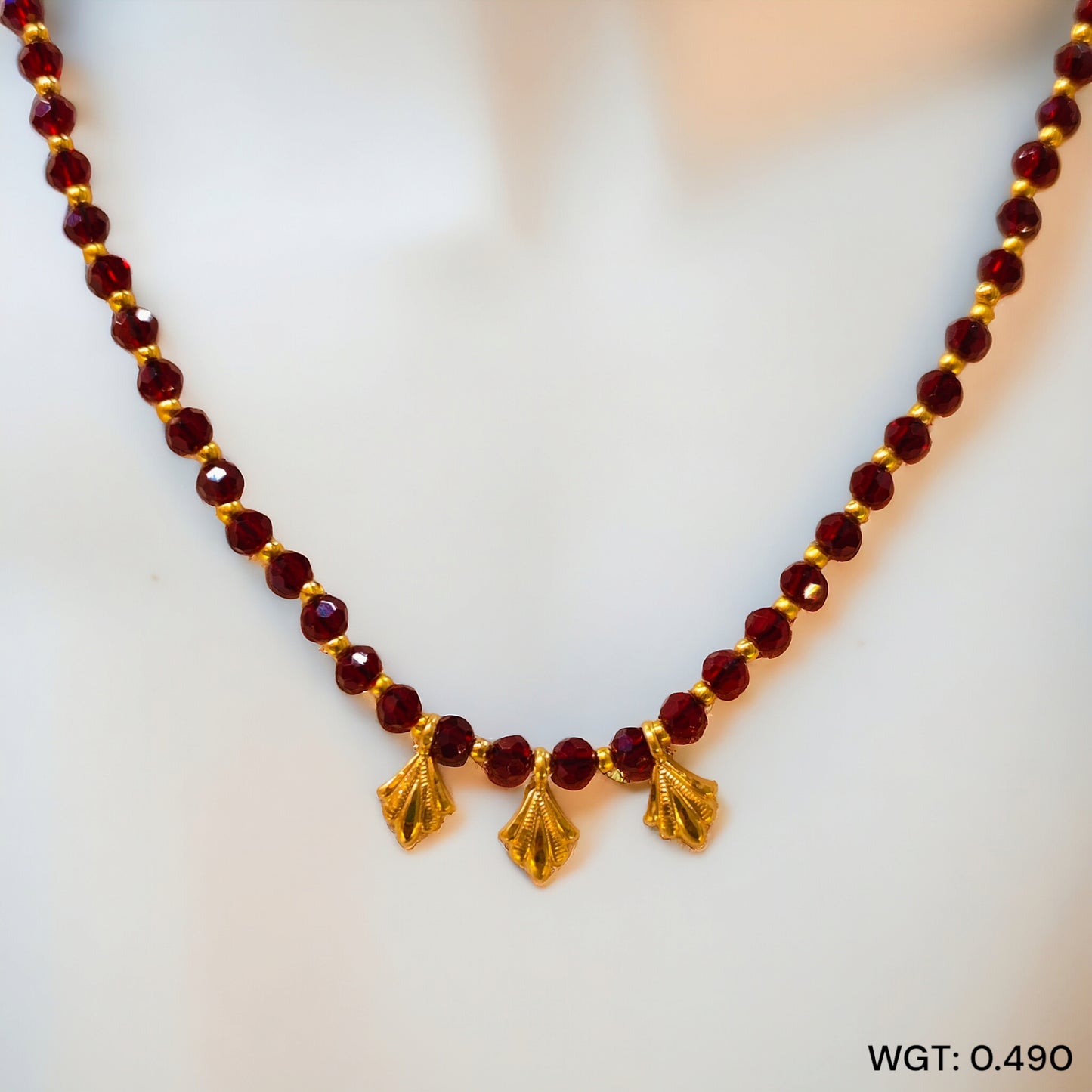 TRJ SOUTH INDIAN STYLE SELI WGT: 0.490 GM APPROX HUID HALLMARK 22KT GOLD SELIHAR 1 PIECE WITH TASSEL.