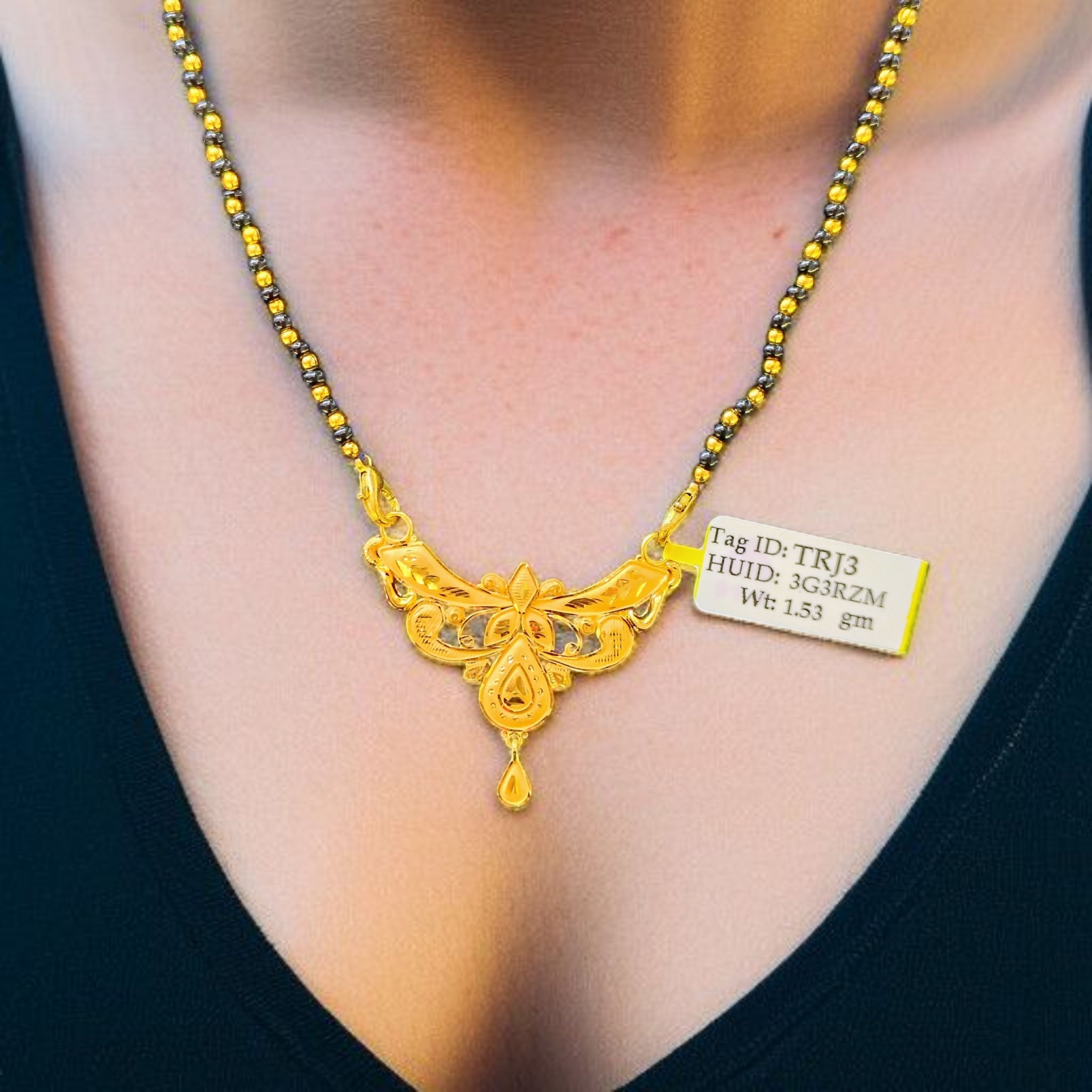 (GPM) TRJ WGT: 1.530 GM APPROX 22KT HUID HALLMARK GOLD PENDANT MANGALSUTRA 1 PIECE WITH TASSEL.