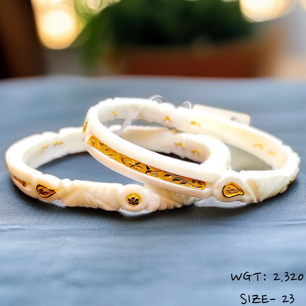 TRJ (SIZE: 23) WGT: 2.320 GM APPROX HUID HALLMARK 22KT GOLD SAKHA BANGLES 1 PAIR DESIGN FOR REGULAR USE.