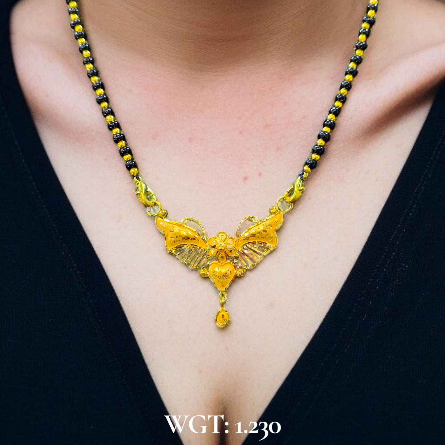 TRJ WGT: 1.230 GM APPROX 22KT HUID HALLMARK GOLD PENDANT MANGALSUTRA 1 PIECE WITH TASSEL.