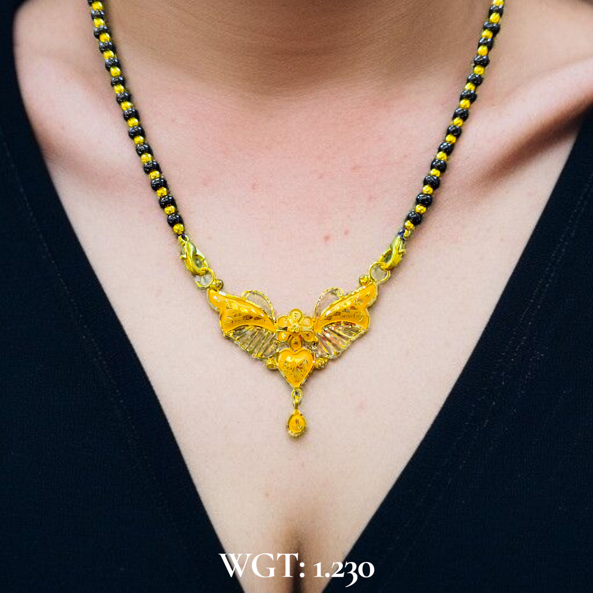 (GPM) TRJ WGT: 1.230 GM APPROX 22KT HUID HALLMARK GOLD PENDANT MANGALSUTRA 1 PIECE WITH TASSEL.