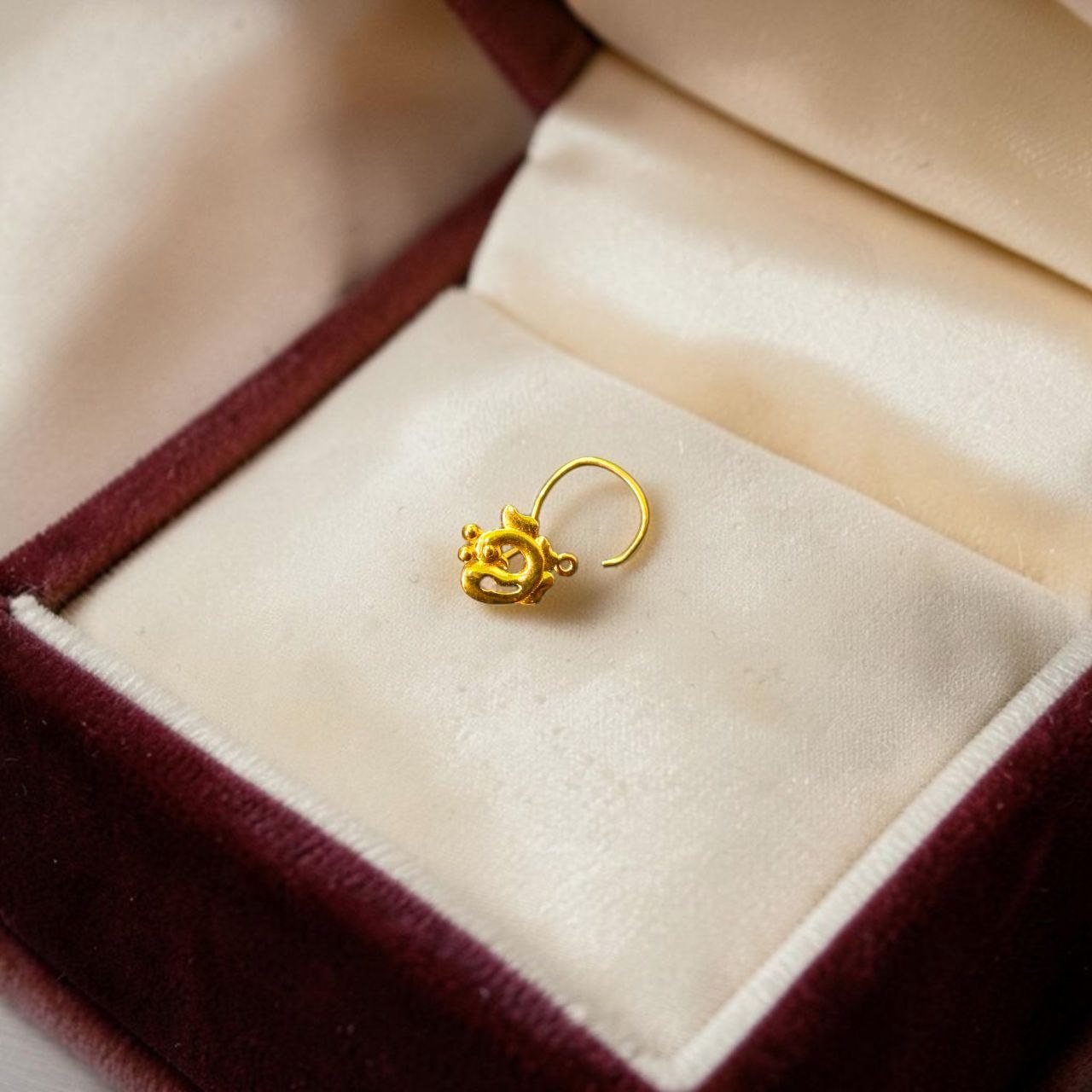 GOLD NOSEPIN- BIS CERTIFIED HUID HALLMARK 375 9KT GOLD NOSEPIN 1 PIECE FOR WOMEN (FOR REGULAR USE). SOLD ON MRP.