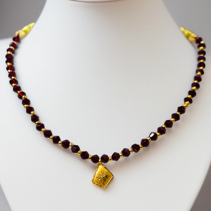 TRJ WGT: 0.150 GM APPROX KDM GOLD BORFI DESIGN LOCKET 1 PIECE WITH MAROON CRYSTAL ADJUSTABLE TASSEL FOR GIFT PURPOSE (50 TONCH).